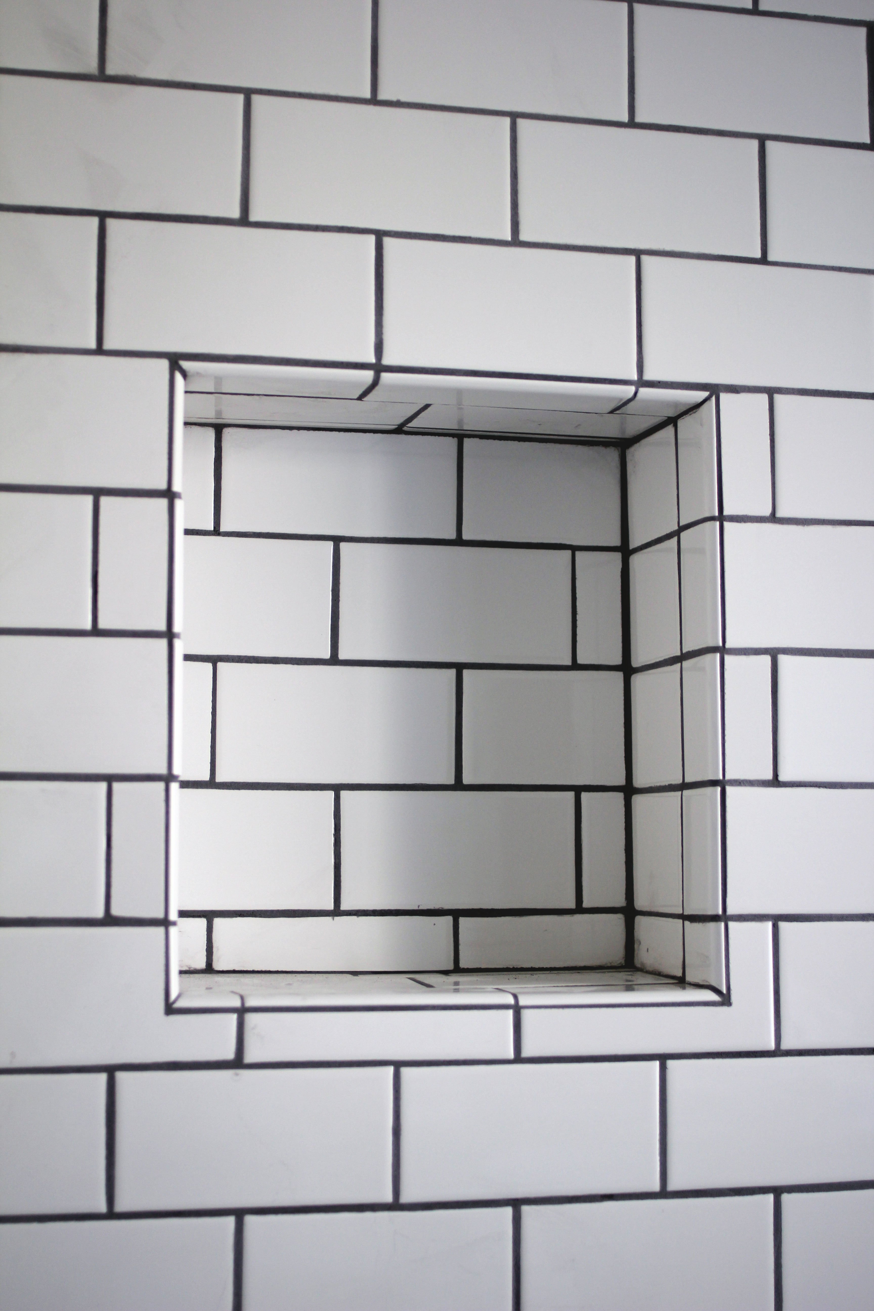 DIY Renovation Project: How To Build a Recessed Shower Shelf