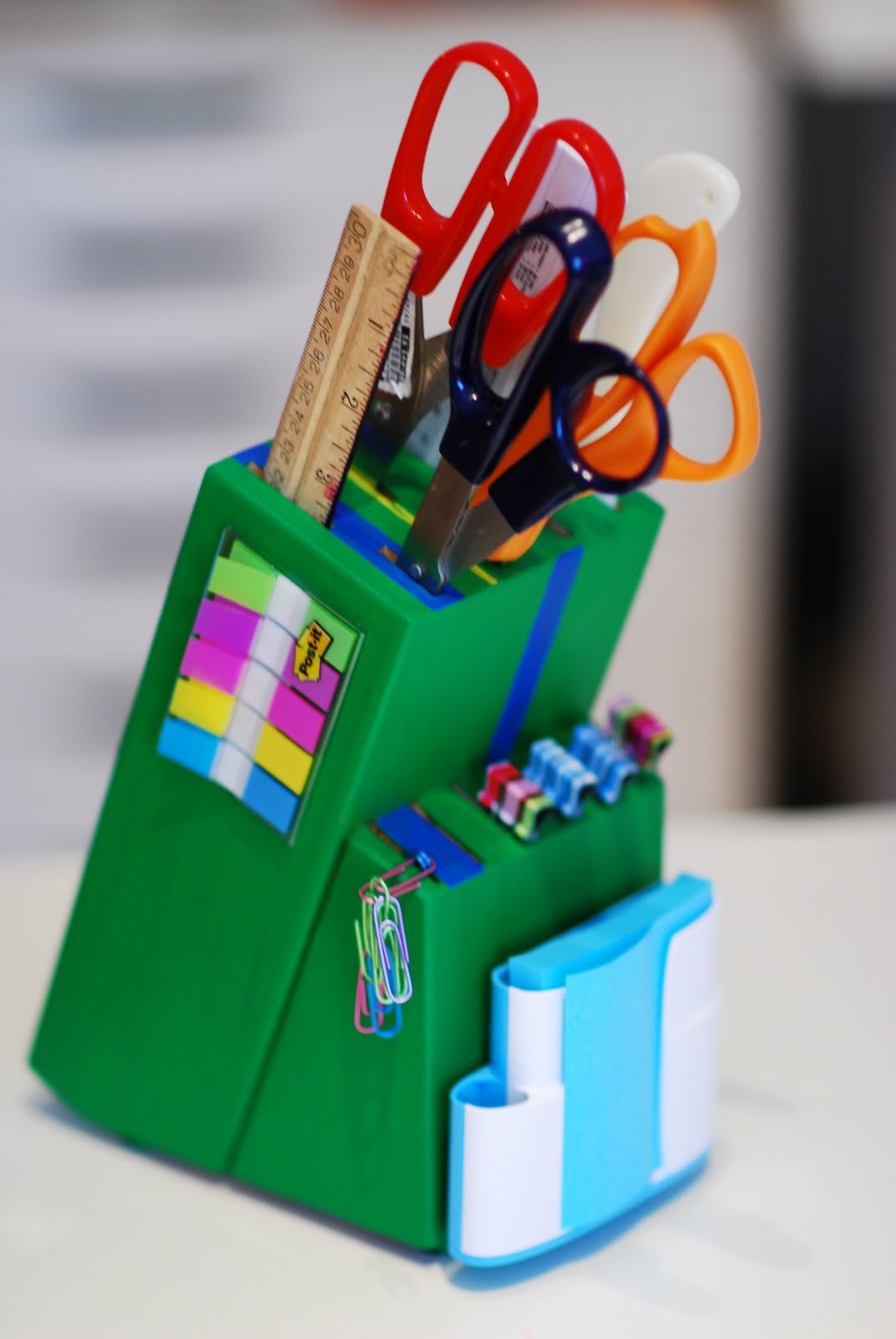 DIY knife block repurposed into a desktop office supply storage caddy.