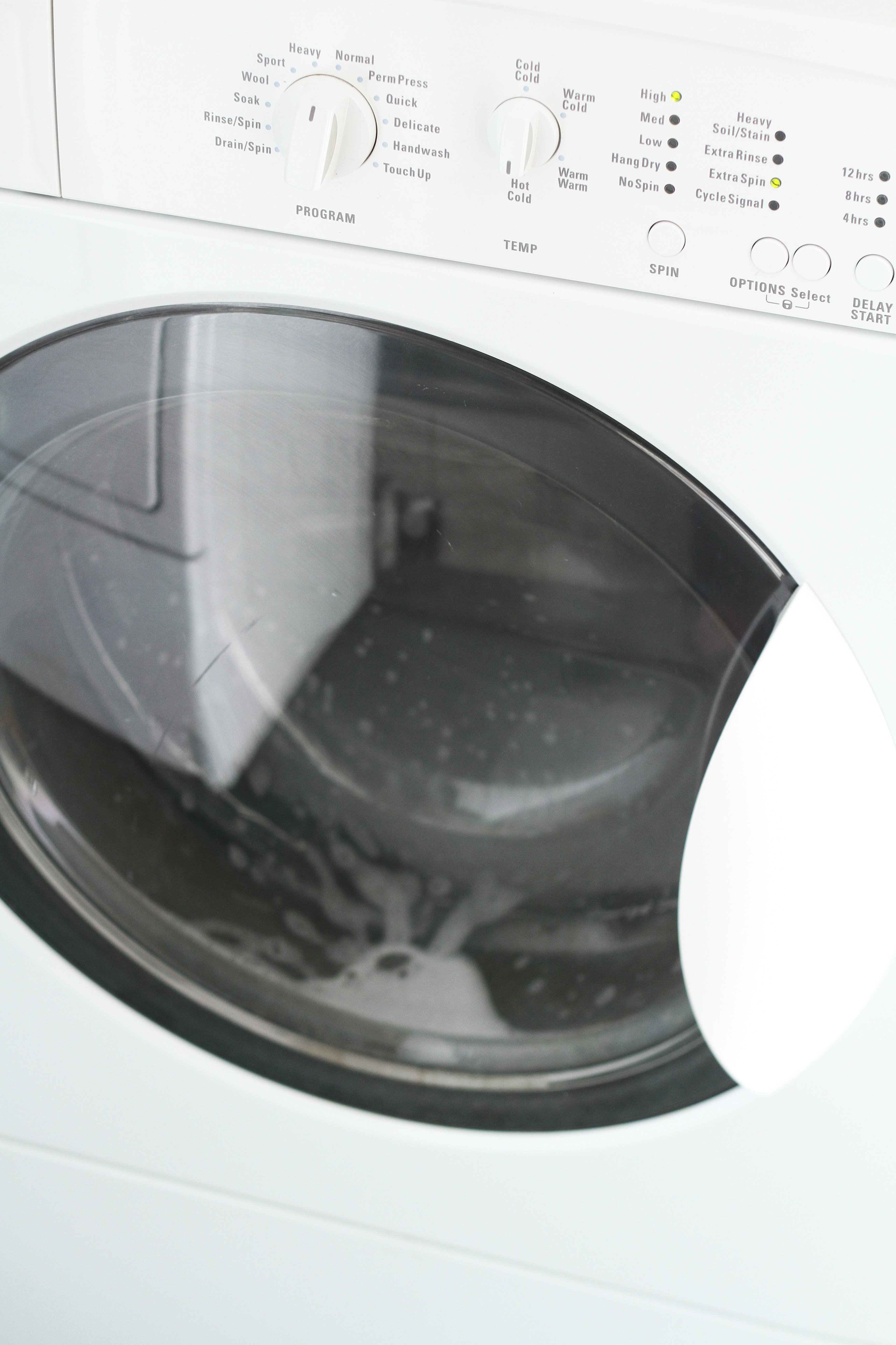 How to Clean a Front Loading Washing Machine & Stop Smells