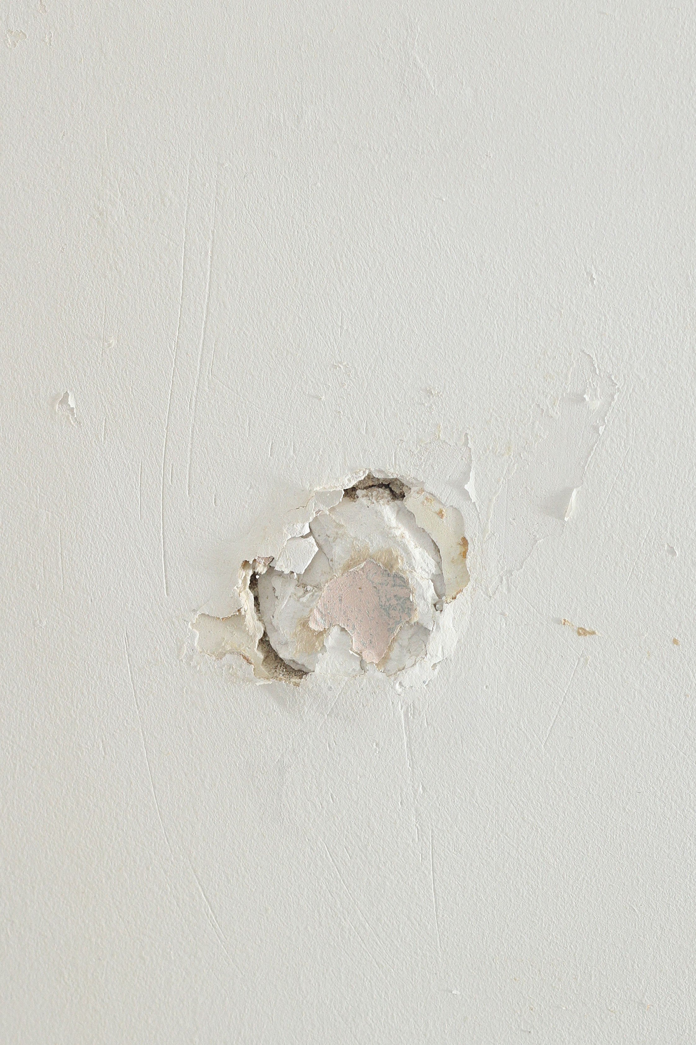 How To Patch A Hole In Drywall Or Plaster Walls Apartment Therapy