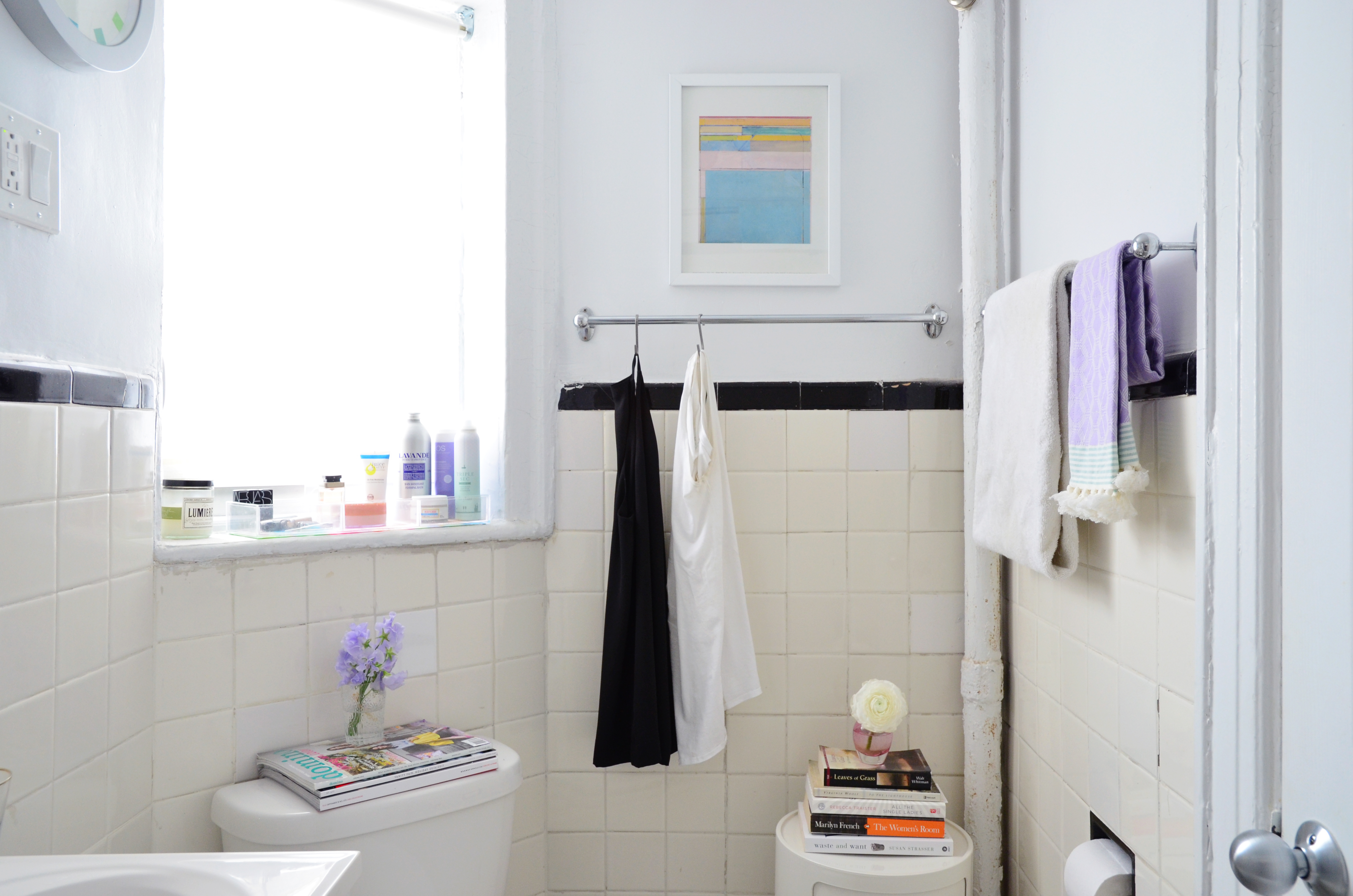 Built-ins Boost Storage in Small Bathrooms