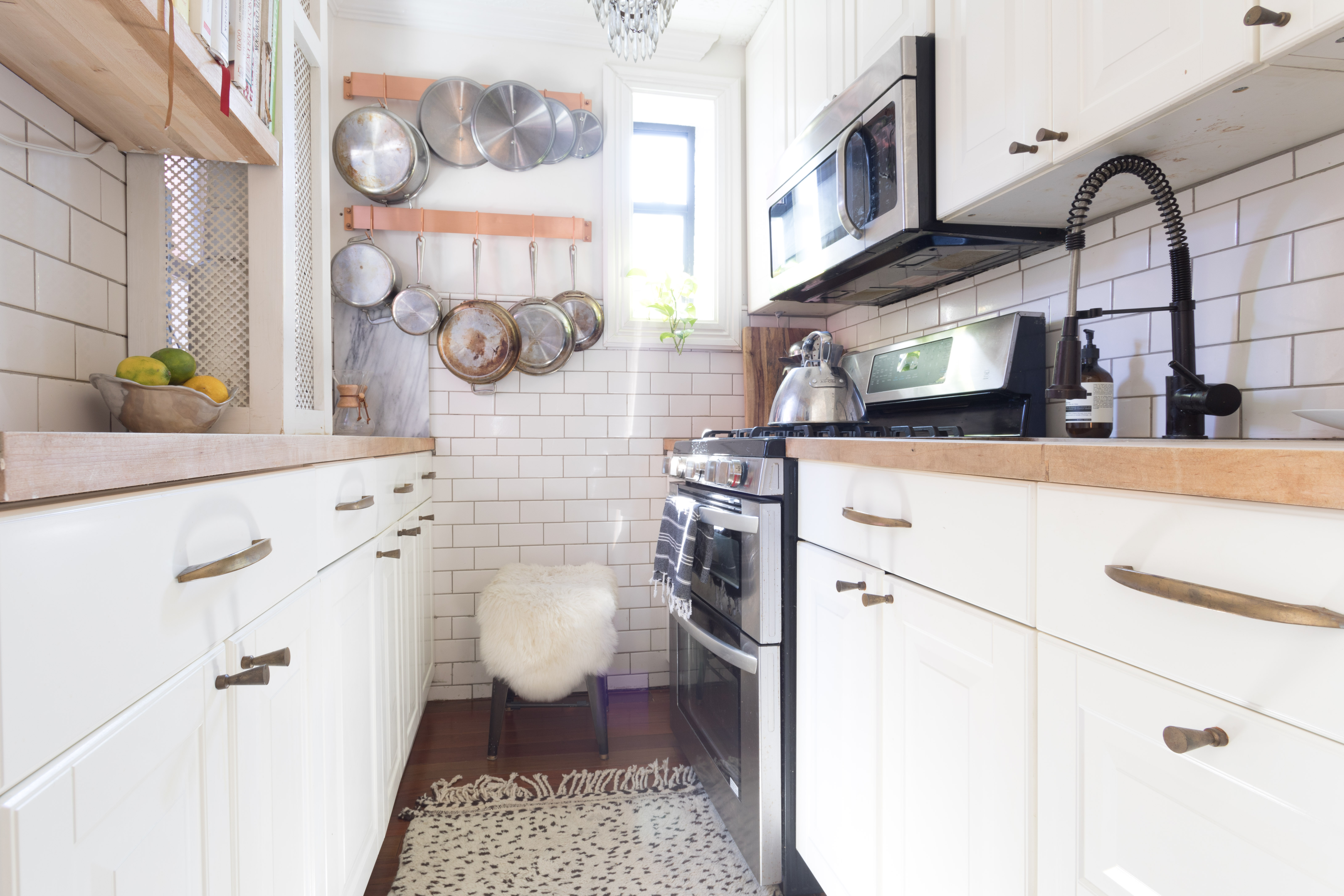 A Small New York City Apartment Kitchen Is Made Light, Bright, & Larger!