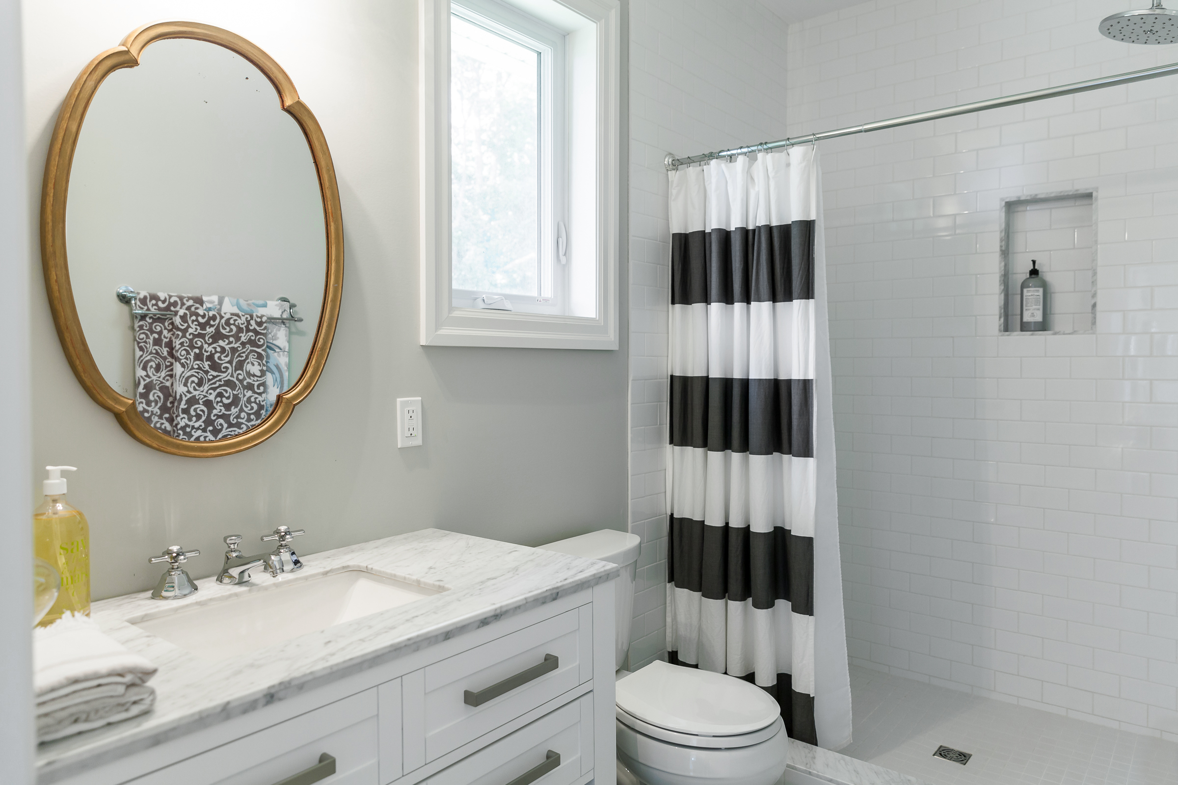 Add extra storage with an extra shower curtain rod, then all you have to so  is…