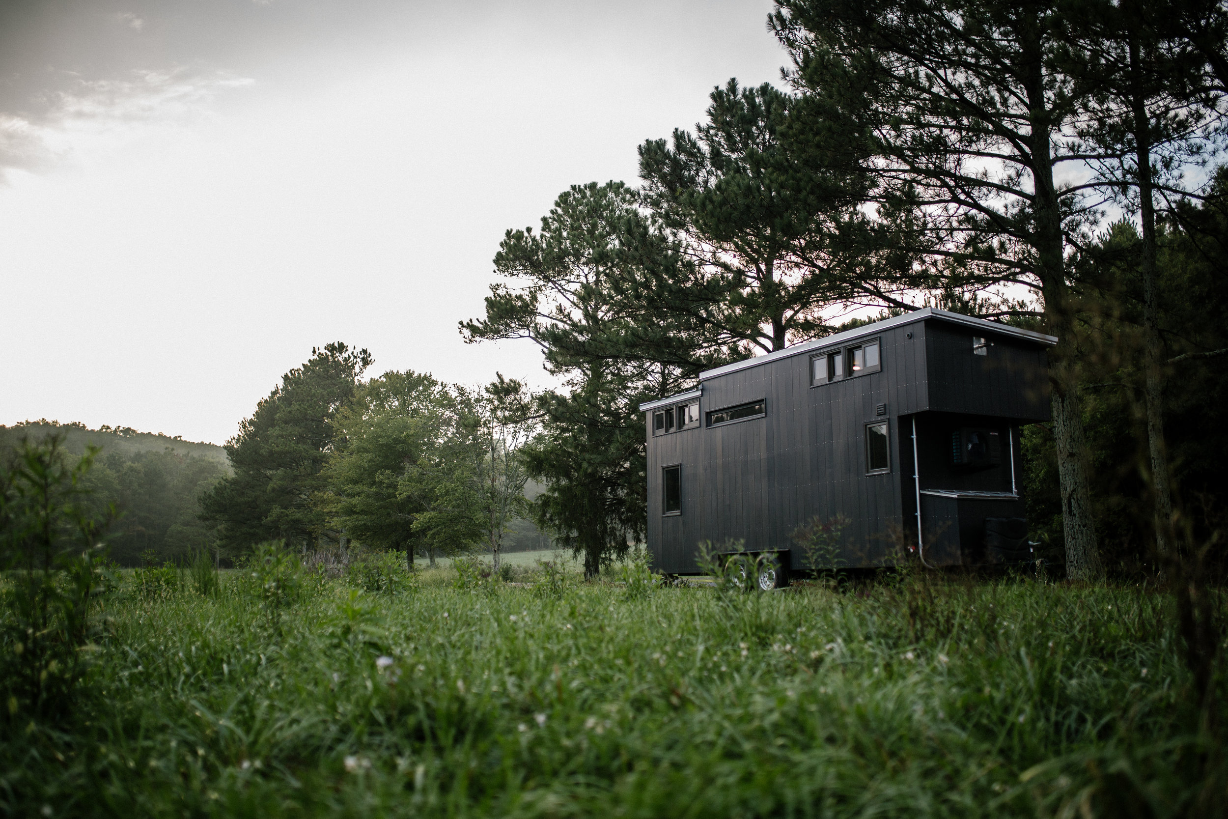 Couple Lives in $90,000 Tiny Home on Wheels With Office, Bedroom, More