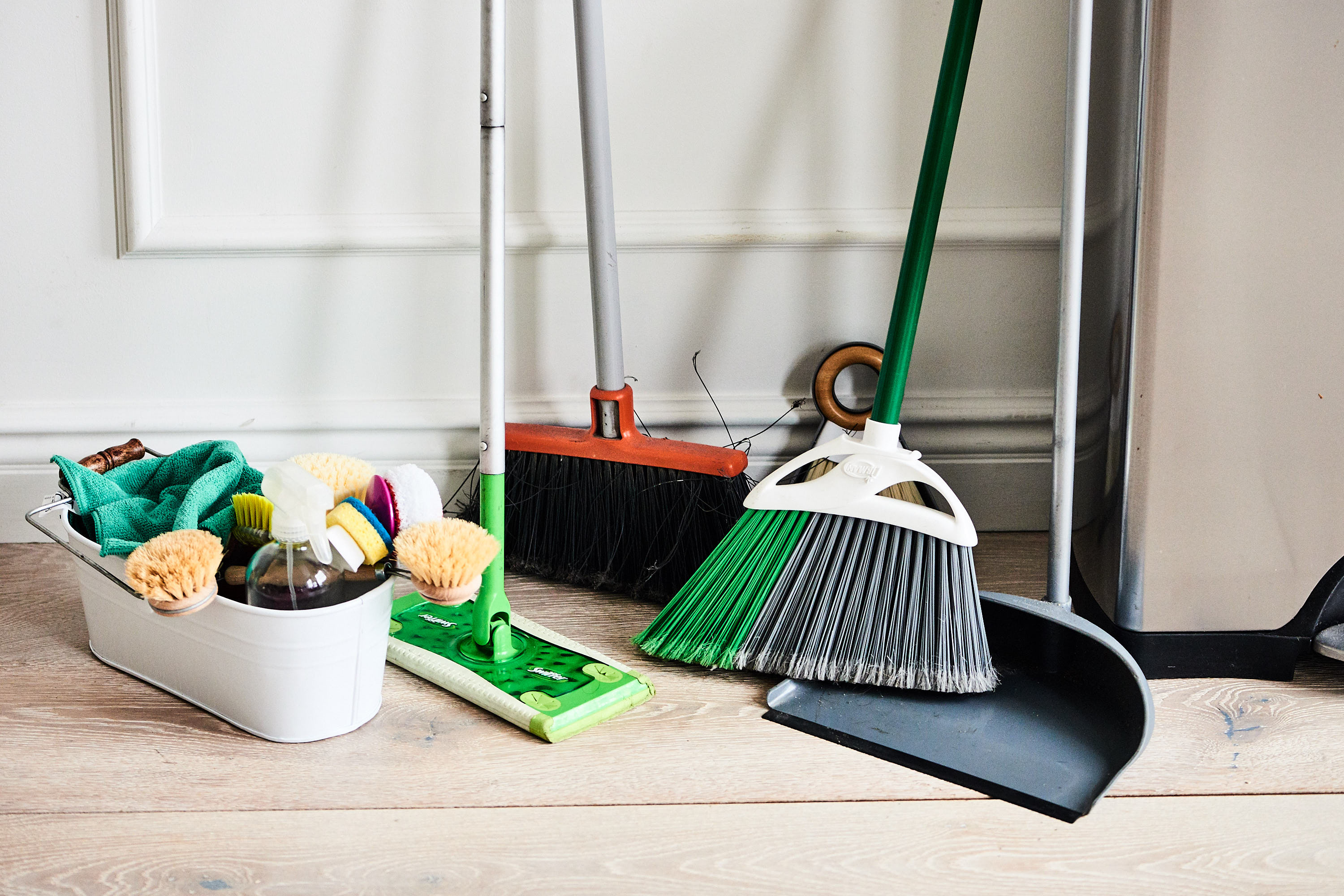 Try This Zip Tie Broom and Mop Storage Idea