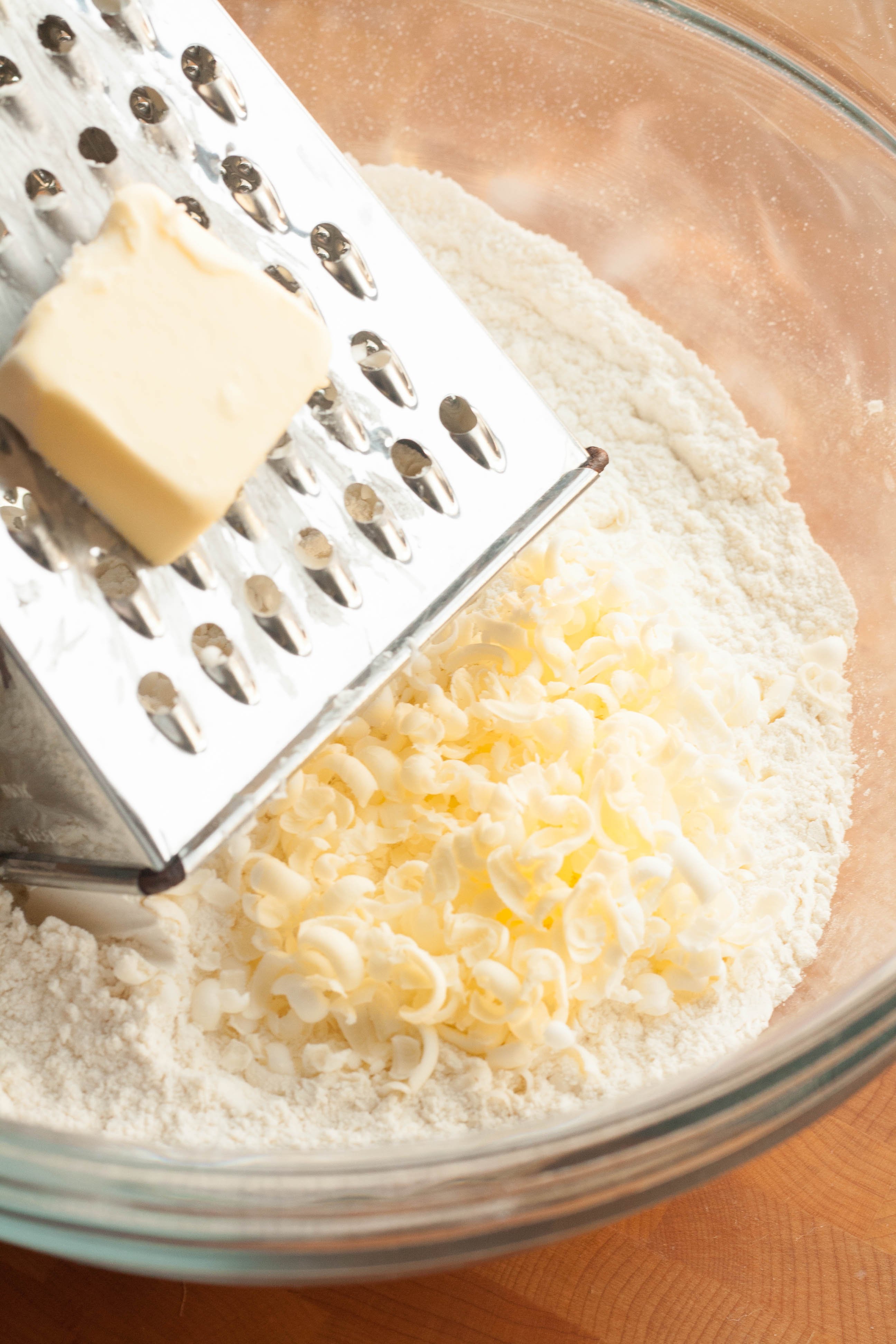 Baking: Grate butter to make flaky pie crust or biscuits