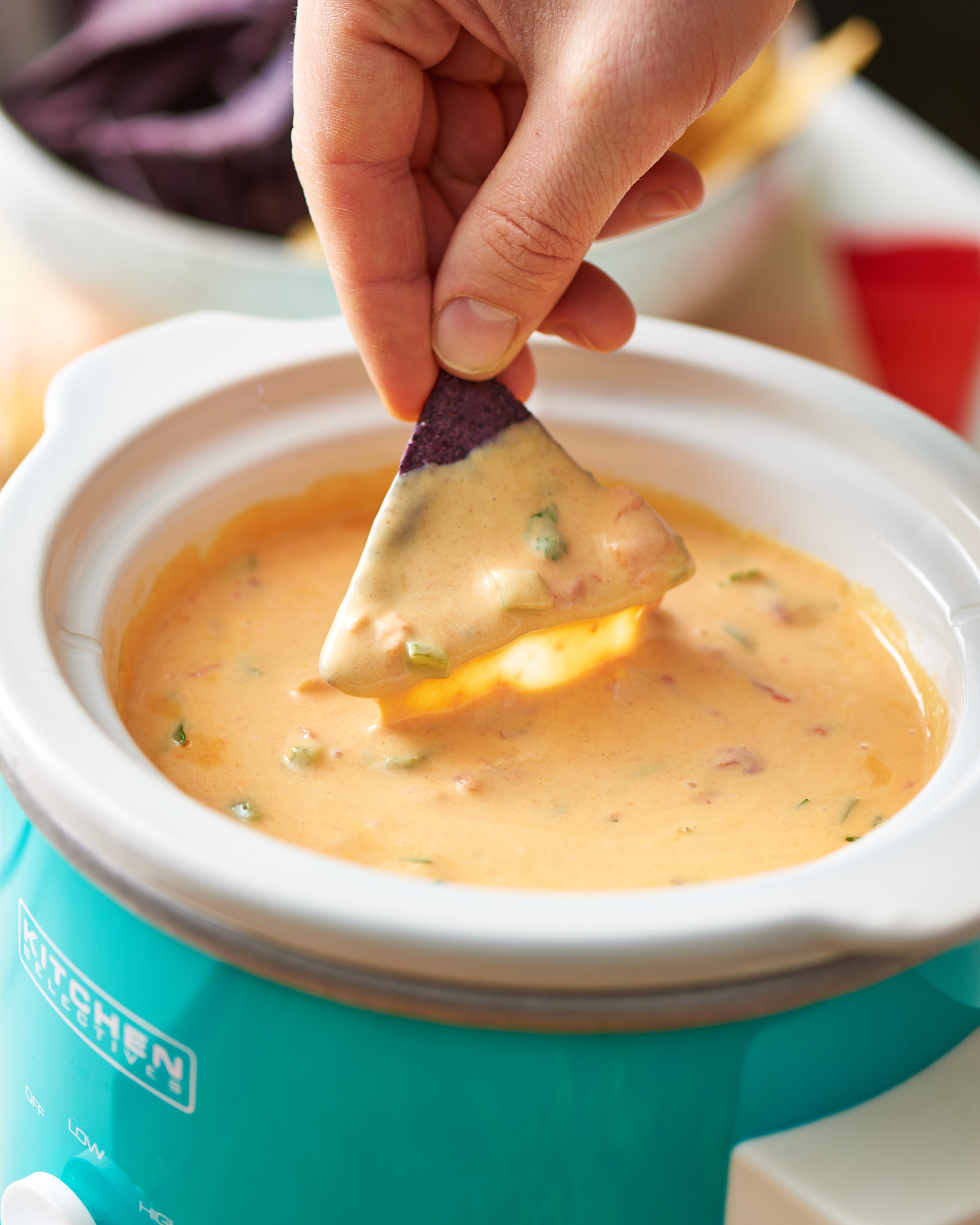 Slow Cooker Queso Chicken Dip