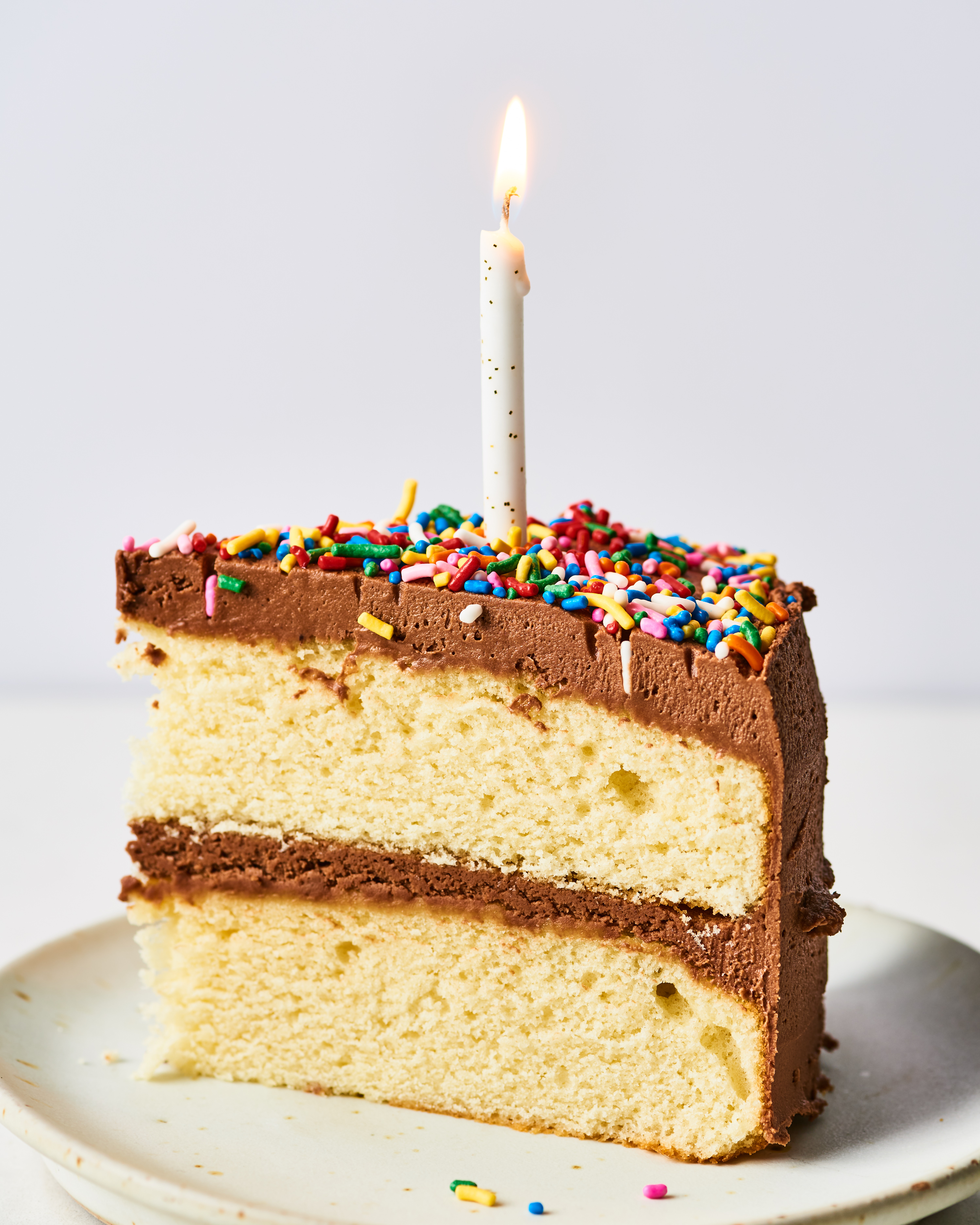 Free Photo | Front view of cake slice inside plate with burning candle | Birthday  cake with candles, Sweet buffet, Birthday cake decorating