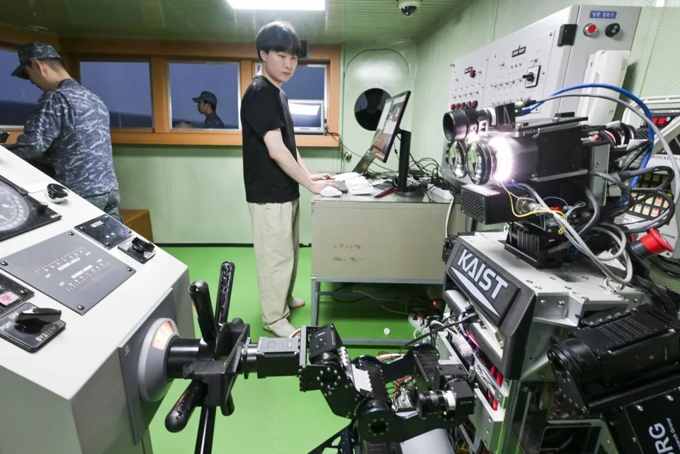 South Korea Navy Tests Pibot Humanoid as Ship Helmsman