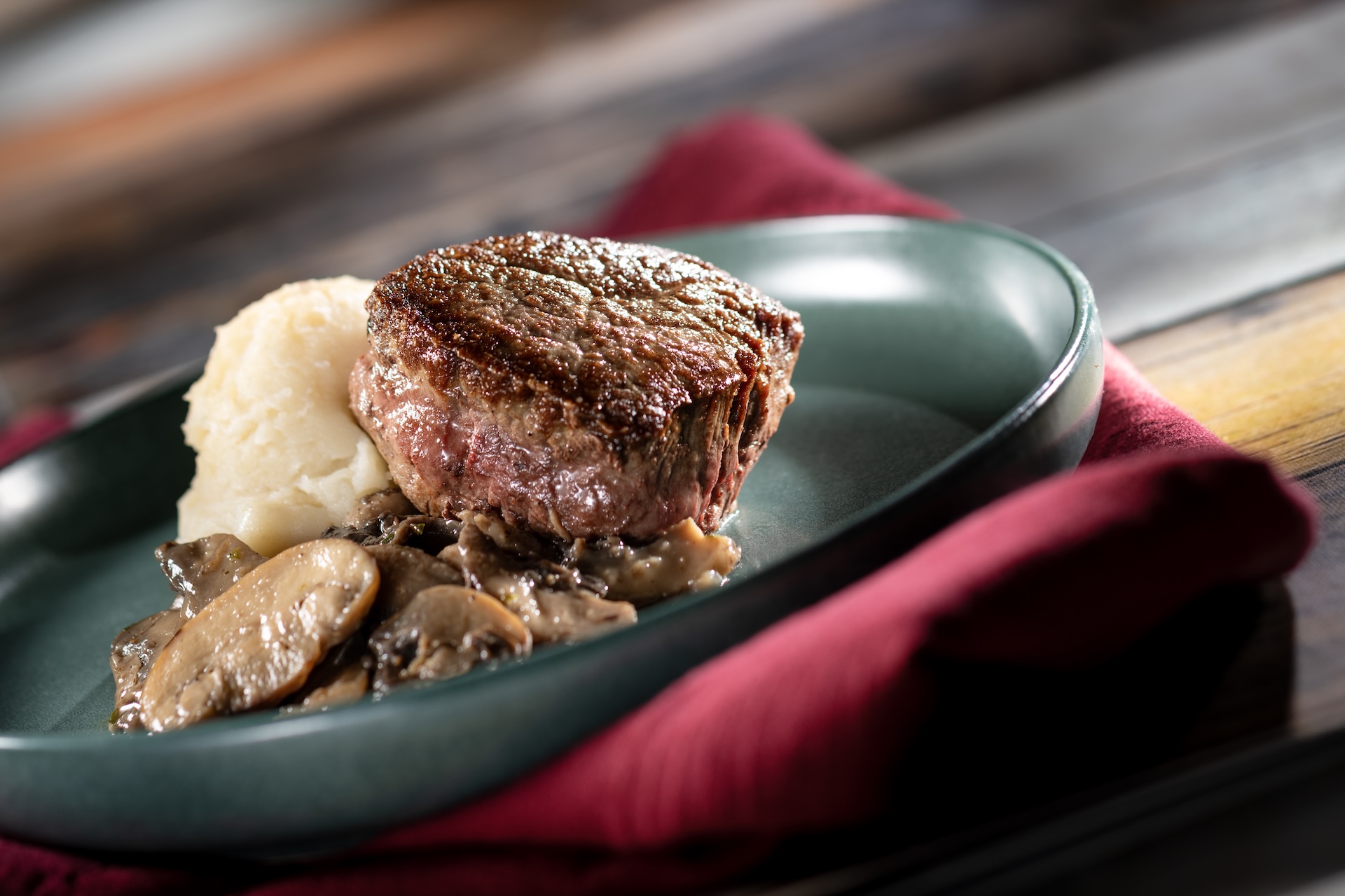 Filet Mignon, with mushrooms and mashed potatoes (Introduced in 2011), served at Canada during the 2026 EPCOT International Food and Wine Festival