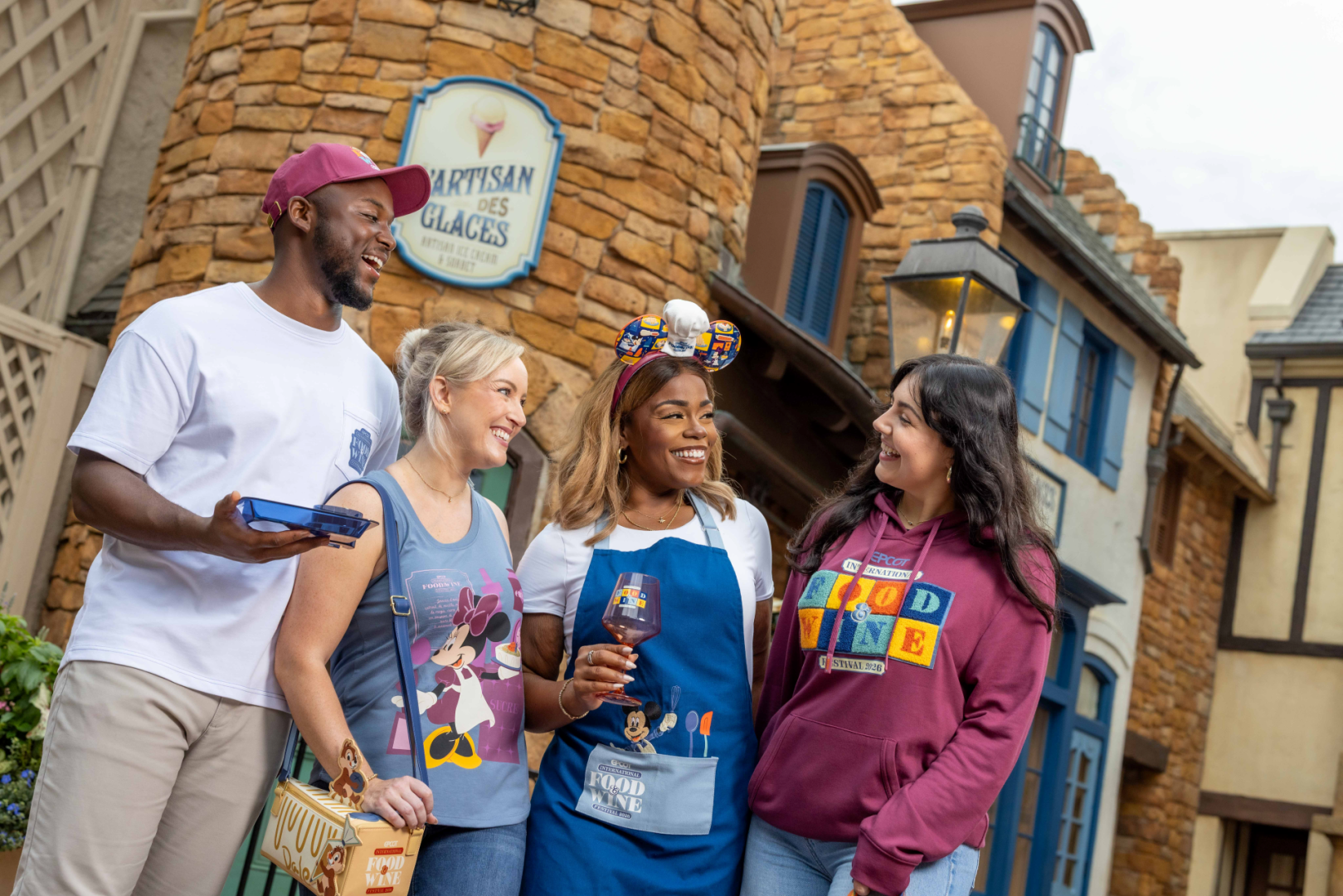 Colorful 2026 EPCOT Food and Wine Festival merchandise display with festival logo items