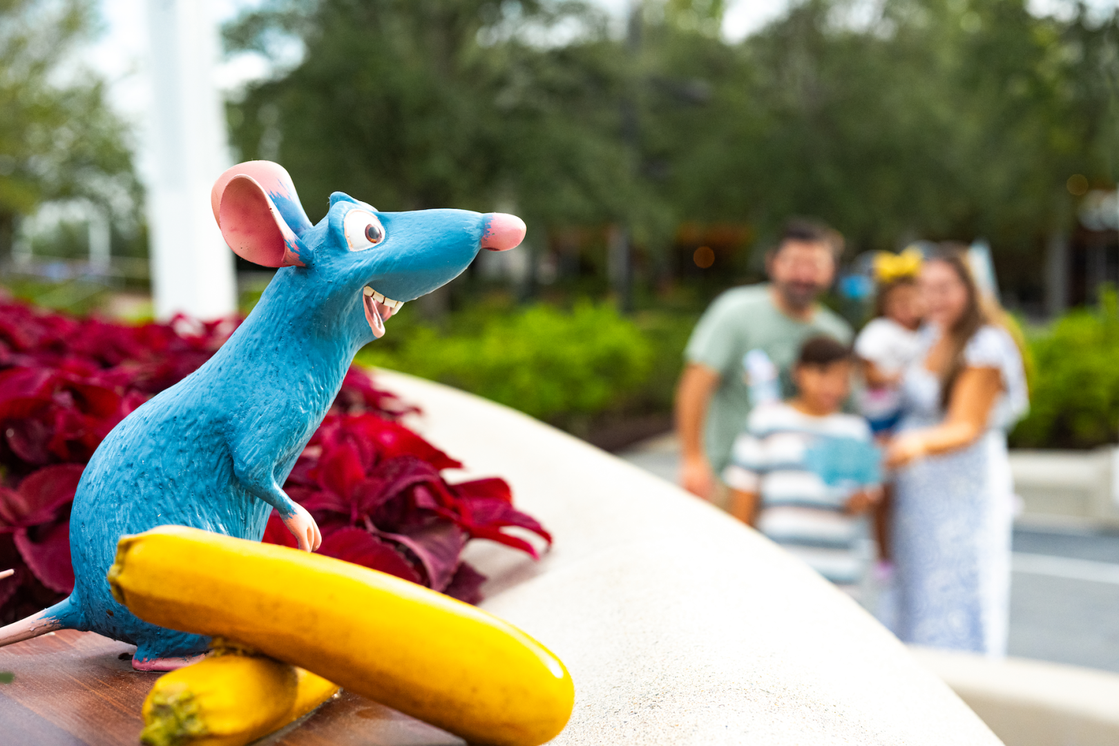 Remy figure hidden in World Showcase for Remy's Hide and Squeak scavenger hunt at the EPCOT Food and Wine Festival