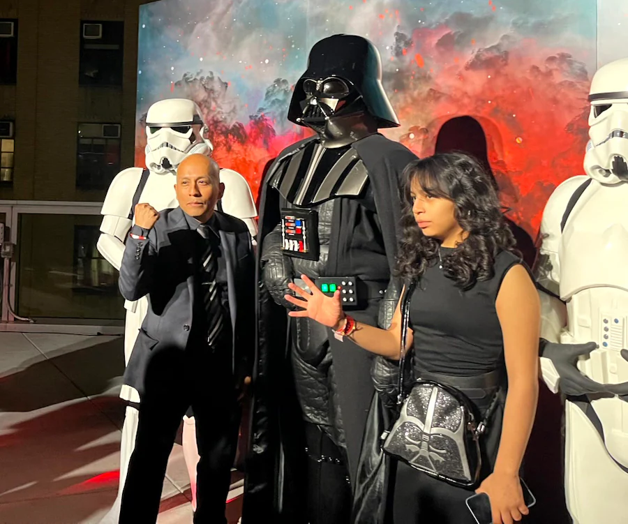 Disney Cast Member enjoying Star Wars products