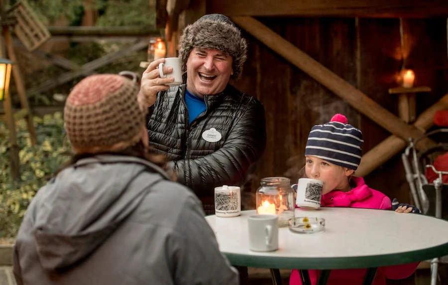 Adventures by Disney Adventure Guide sharing a moment with a family