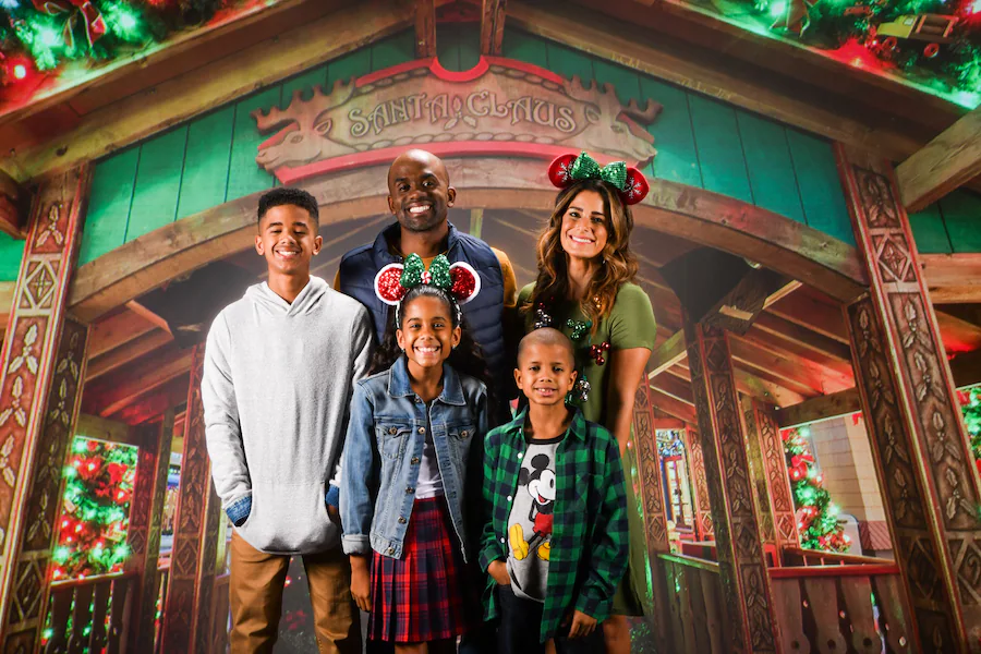 Festive Disney PhotoPass Studio holiday photo at Disney Springs