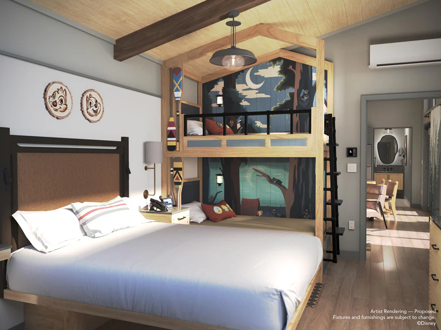 A worker helps assemble a prefabricated Fort Wilderness cabin