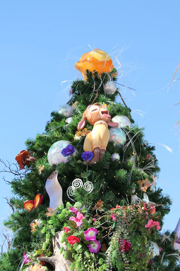 Christmas tree inspired by the Disney film "Wish" at Disney Springs, its branches filled with flowers