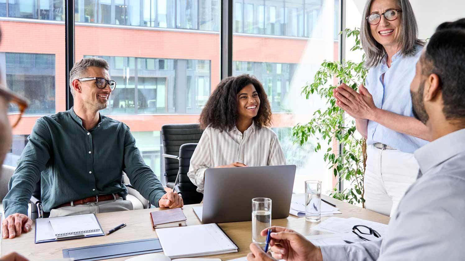 People sitting at board room table