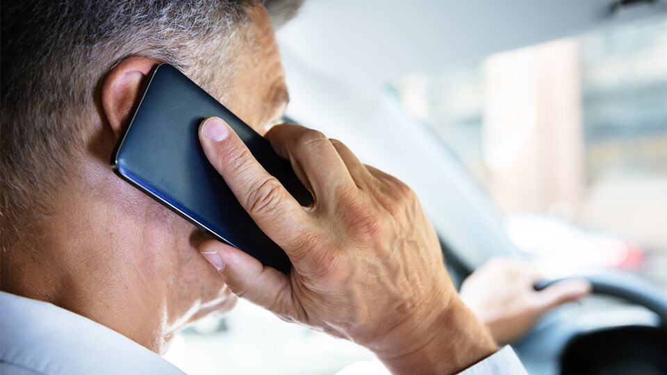 Distracted driver on cell phone