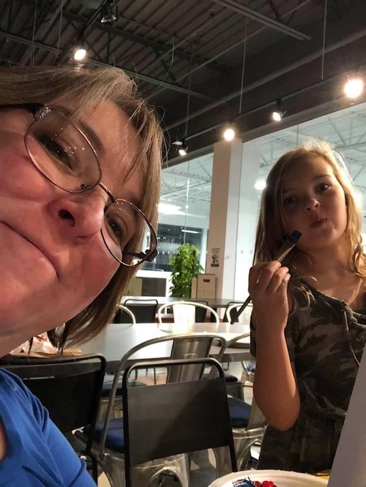 A picture of Rebecca and her daughter.