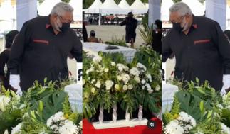 Rawlings Struggles With Tears As He Holds His Mother's Casket
