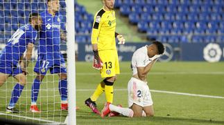 Real Madrid lose momentum in title race with Getafe draw