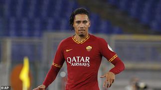 Armed intruders hold Chris Smalling, his wife and son at gunpoint