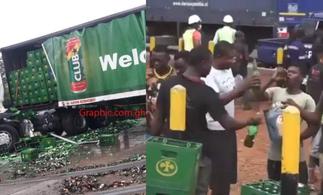 Video of Ghanaian Men Happily Drinking From Fallen Beer Truck On Motorway Goes Viral