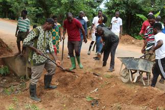 MP leads residents to fix bad roads as gov't delays