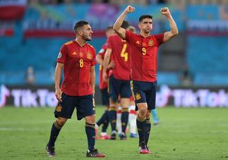 Spain and Sweden advance after massive victories