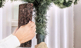 The Christmas Tree Hugger: Keep Your Tree Upright and Your Home Safe