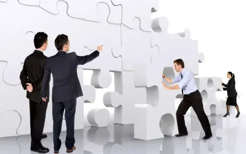 Business Consolidation: Definition, Meaning, Examples, and How It Works