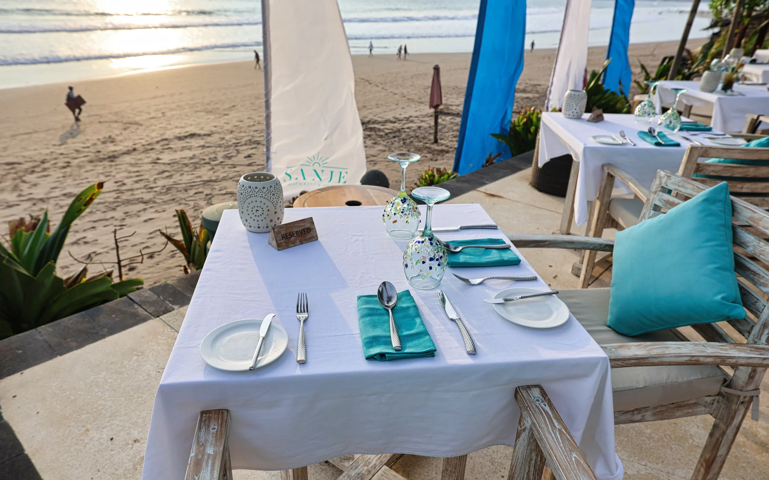 Beachfront table reservation at Sanje