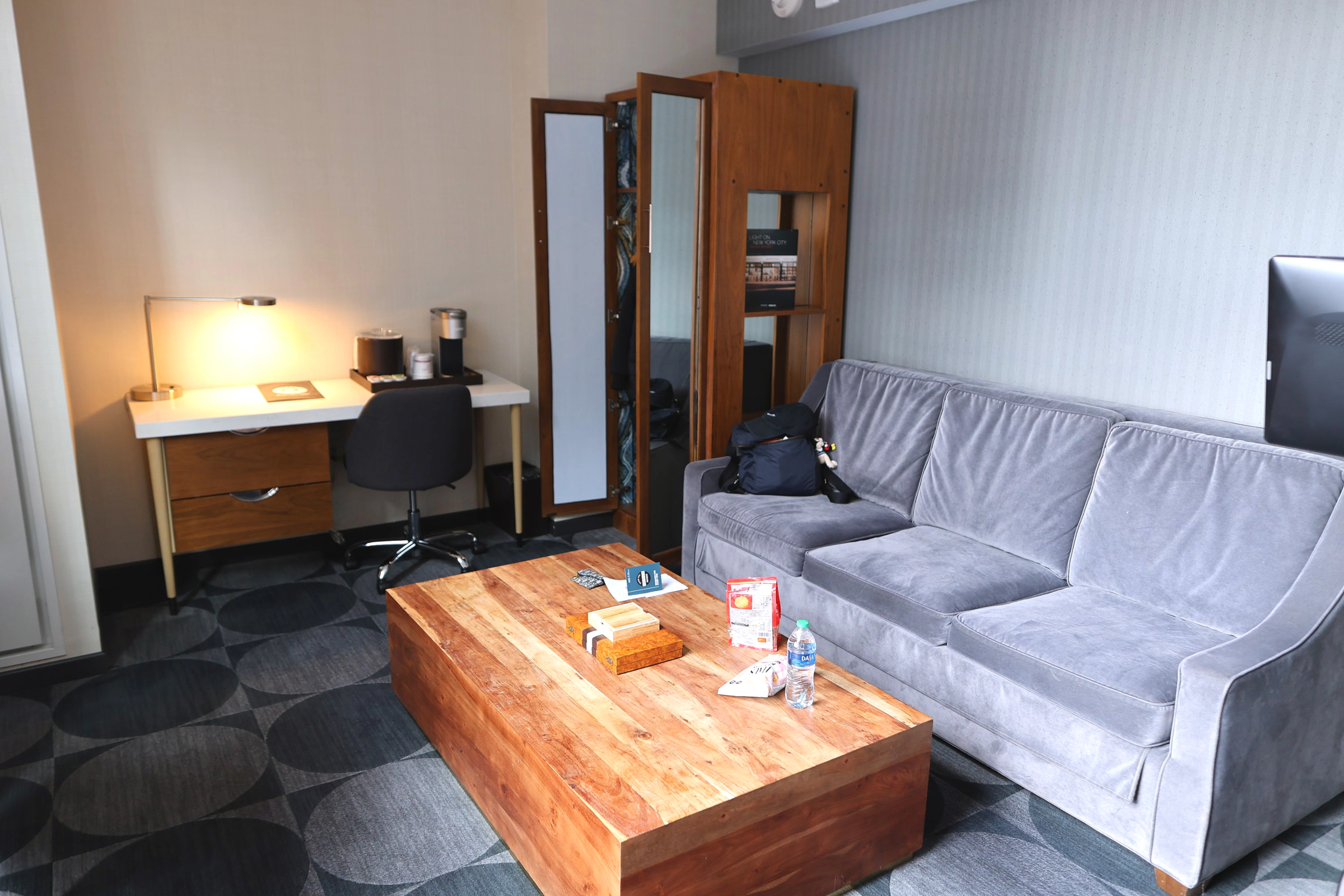 Spacious living room with table and sofa