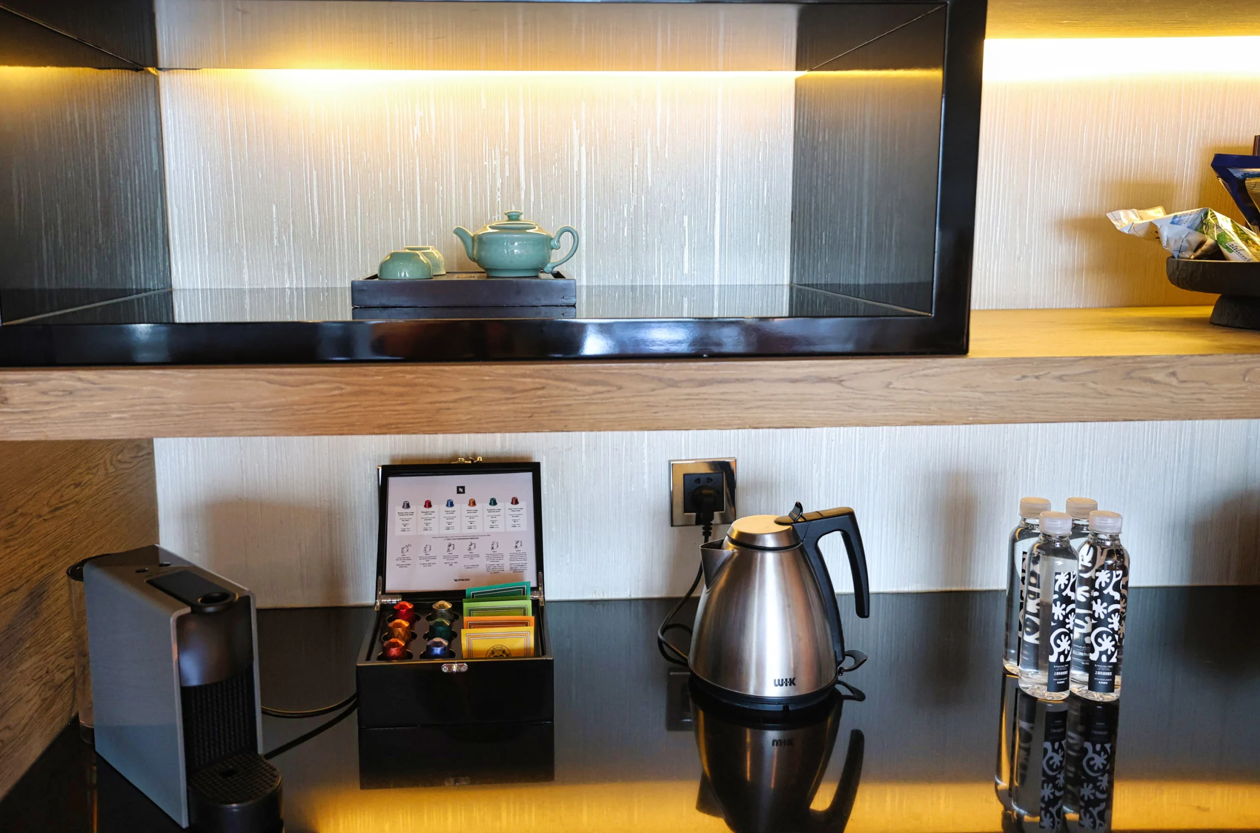 In-room coffee machine with capsules and tea selection