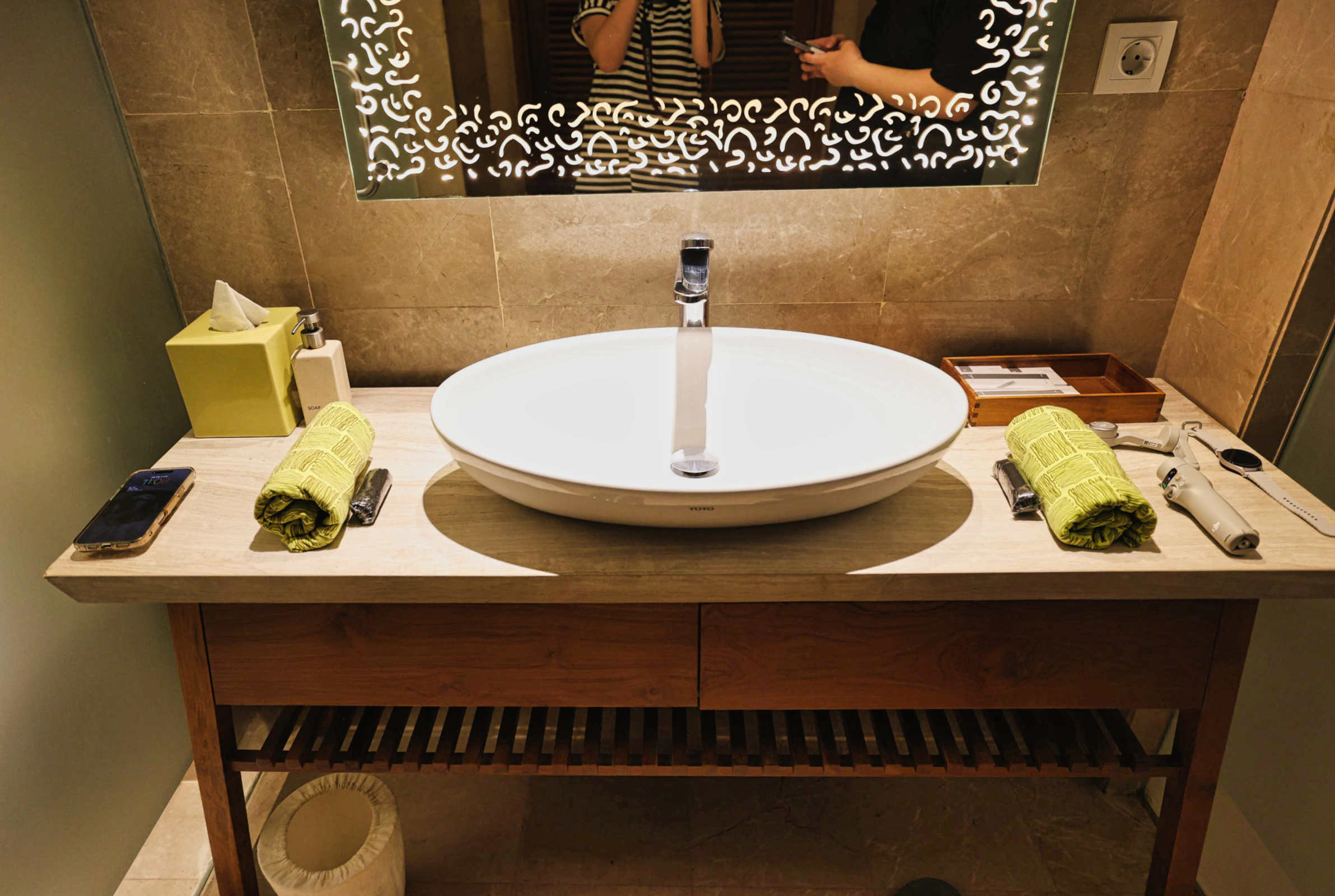 Amenities and layout of a couple's spa room at Maya Sanur