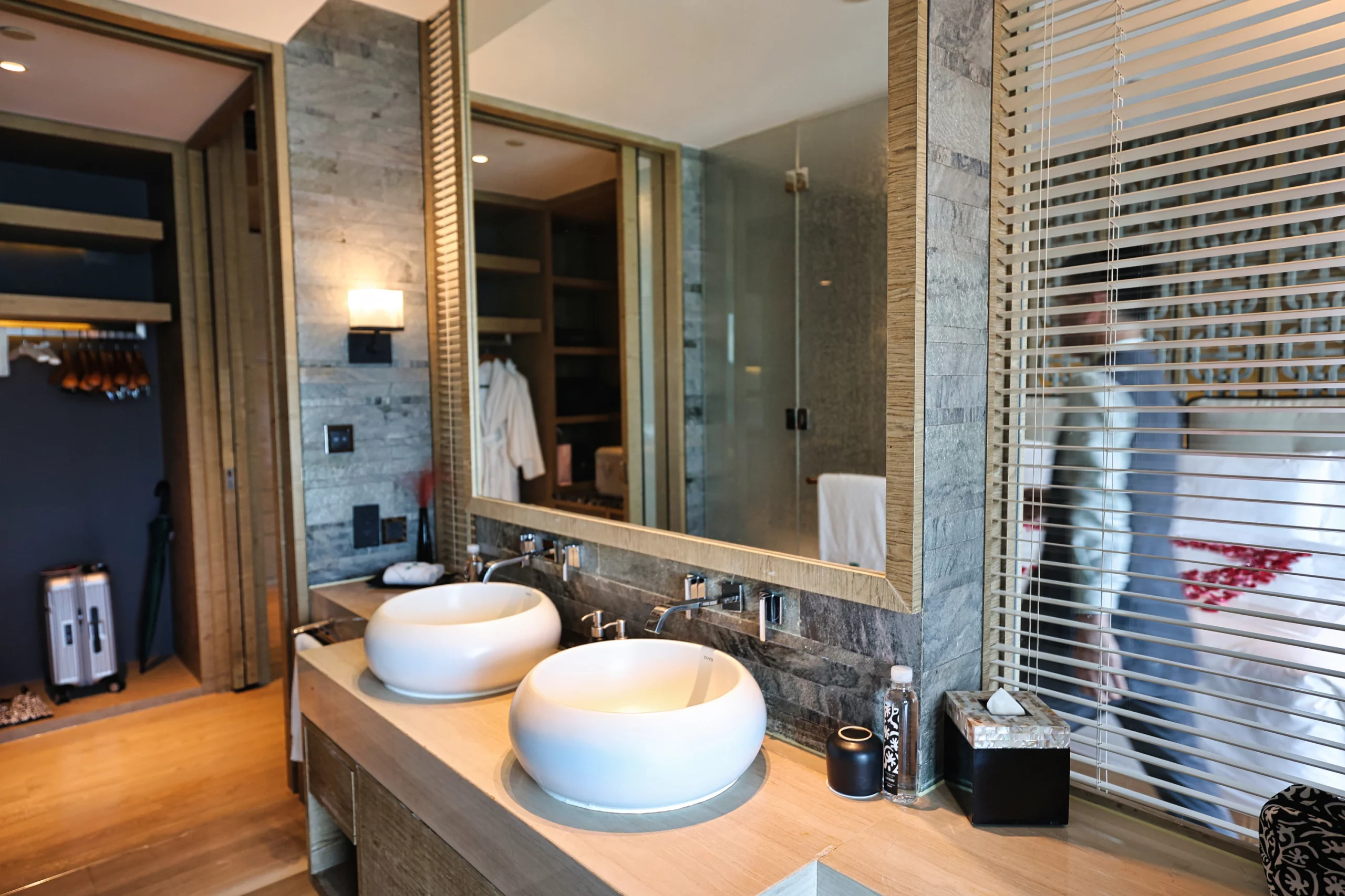 Large mirror and soft towels in the bathroom area
