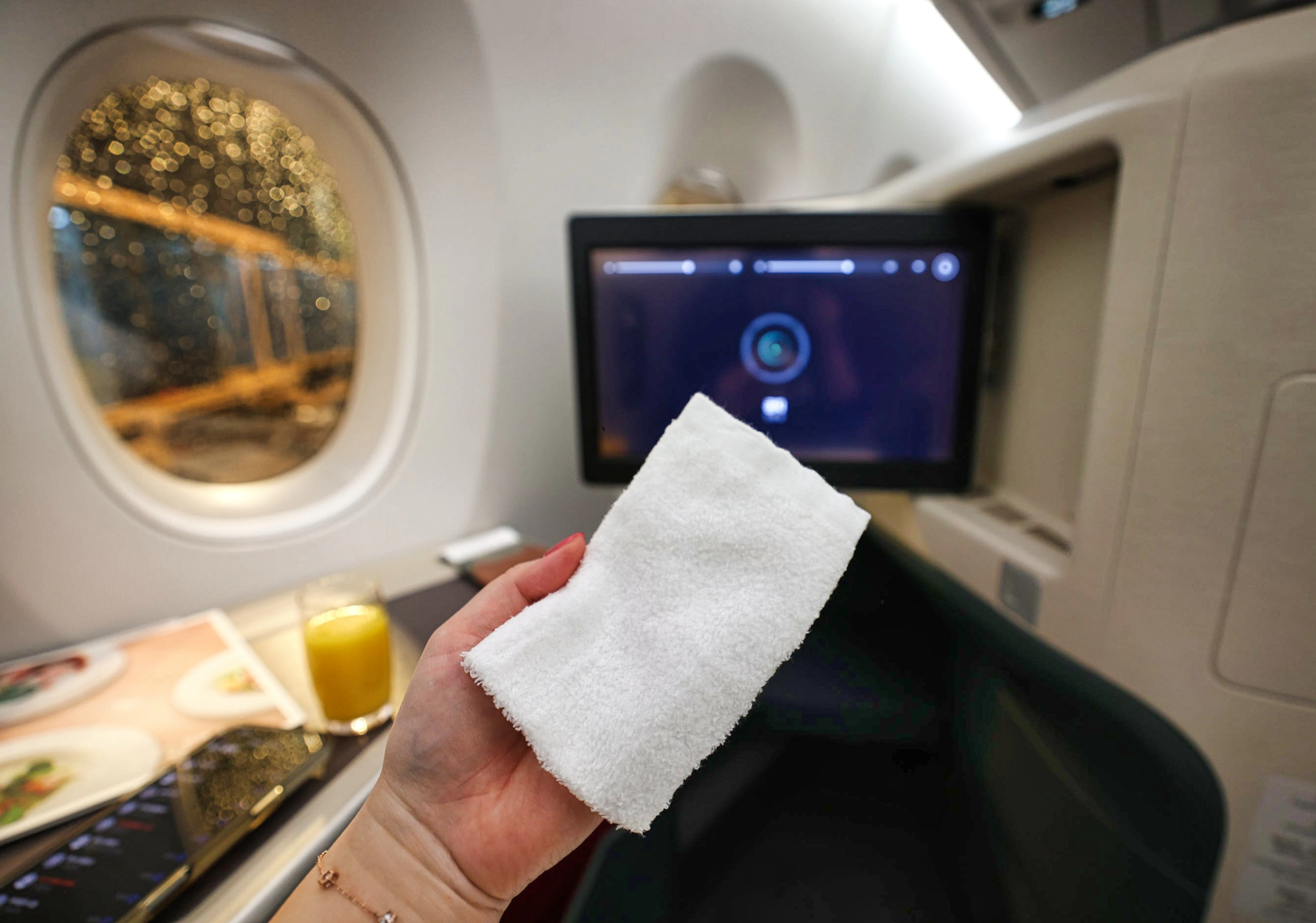 Welcome drink being served in business class