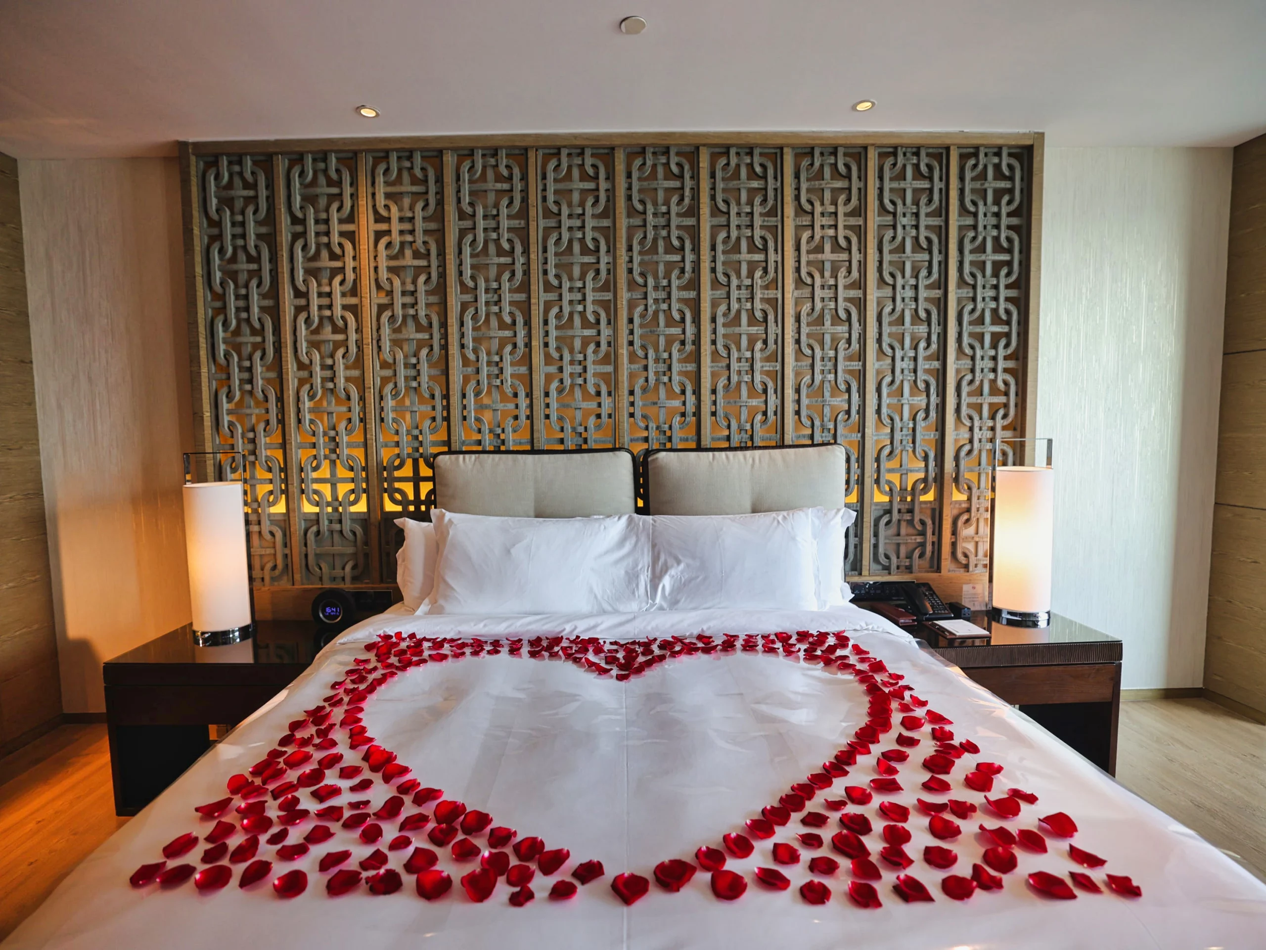 Spacious King bed and sofa setup in hotel room