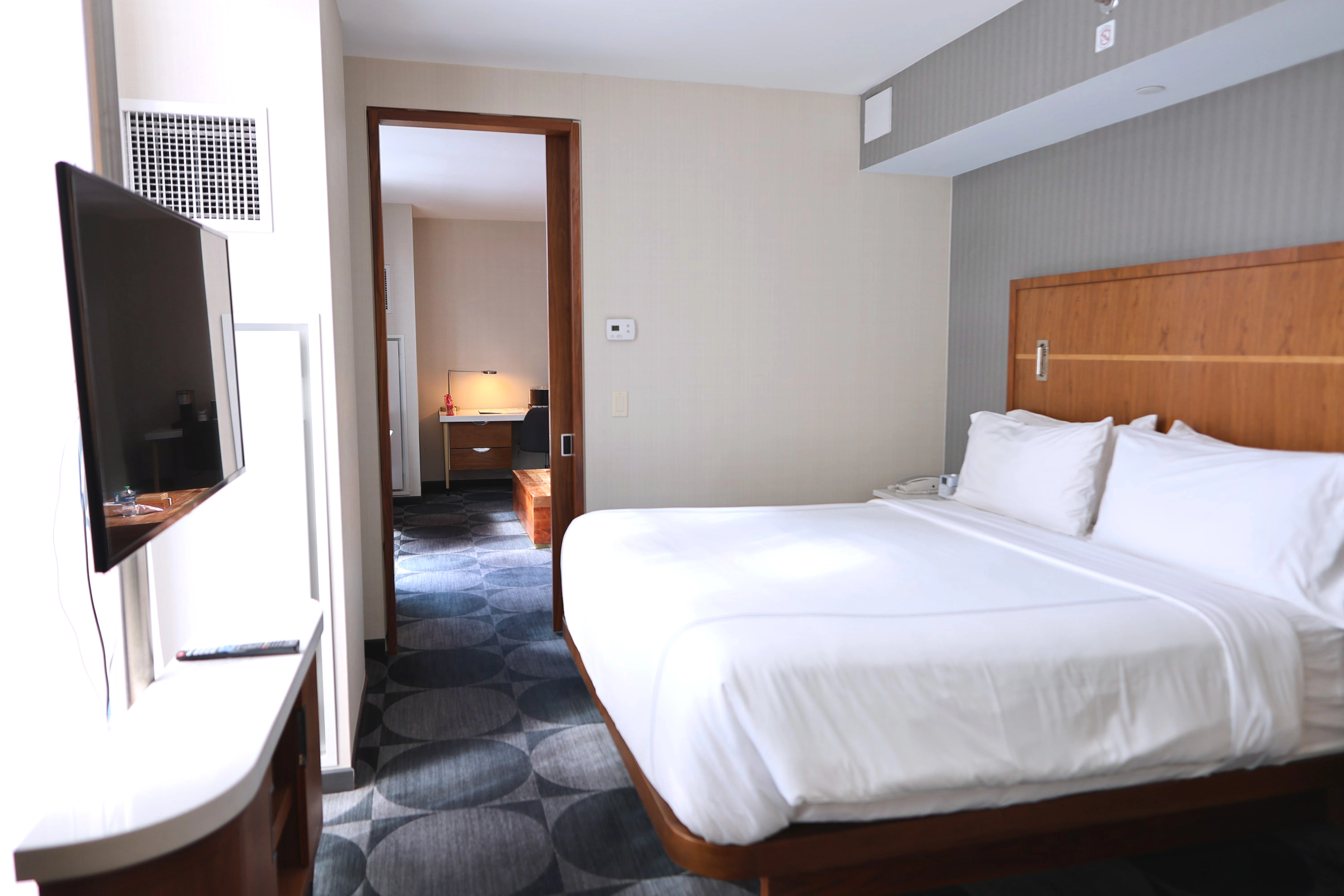 King-size bed and TV in the suite bedroom