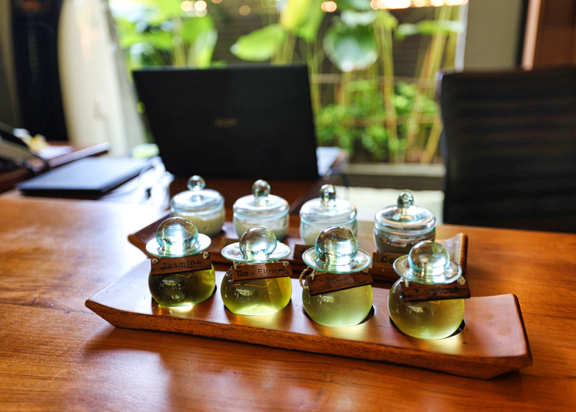 Pre-treatment consultation and oil selection at Maya Sanur Spa