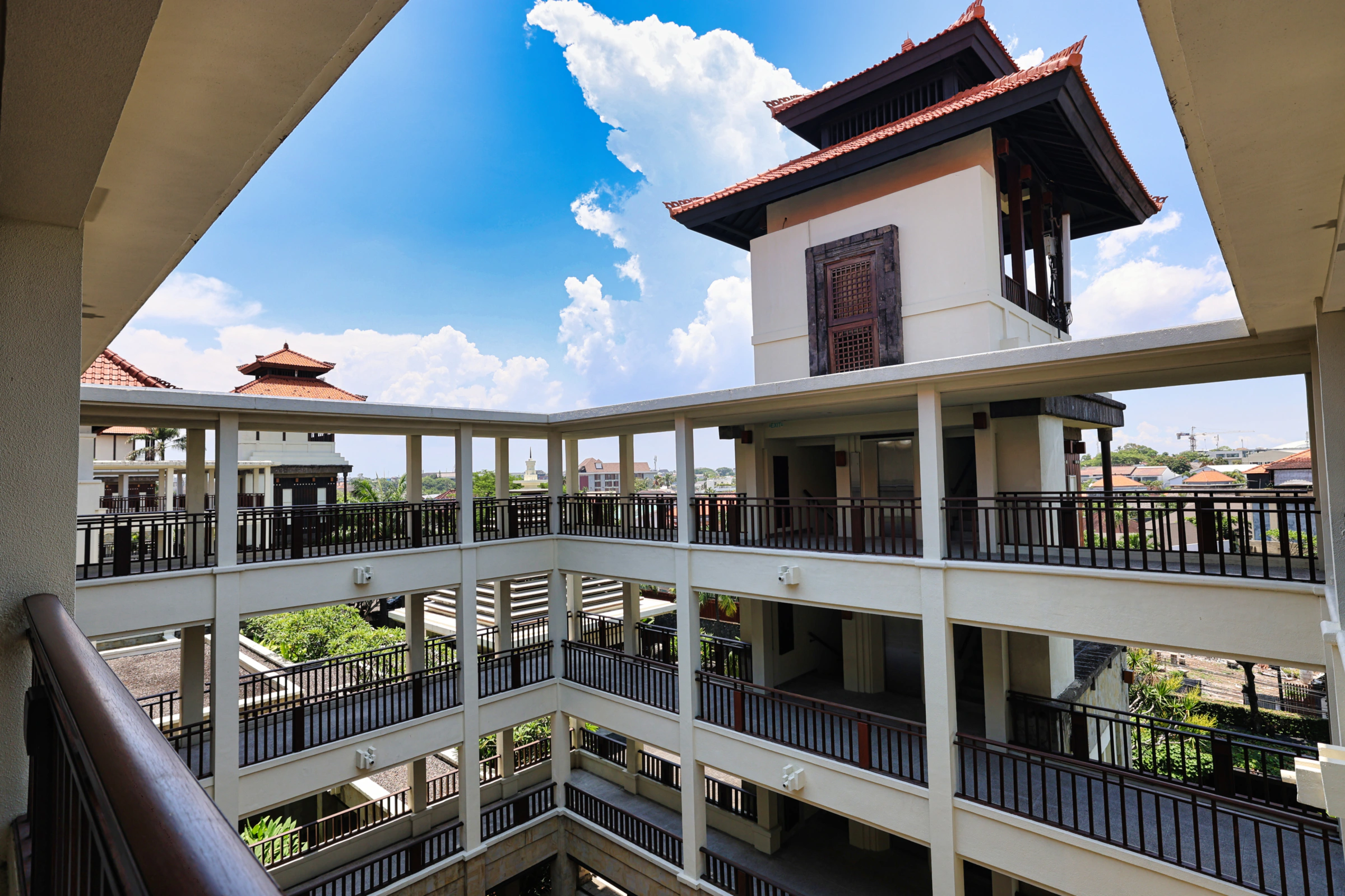 Open corridor design in a tropical hotel