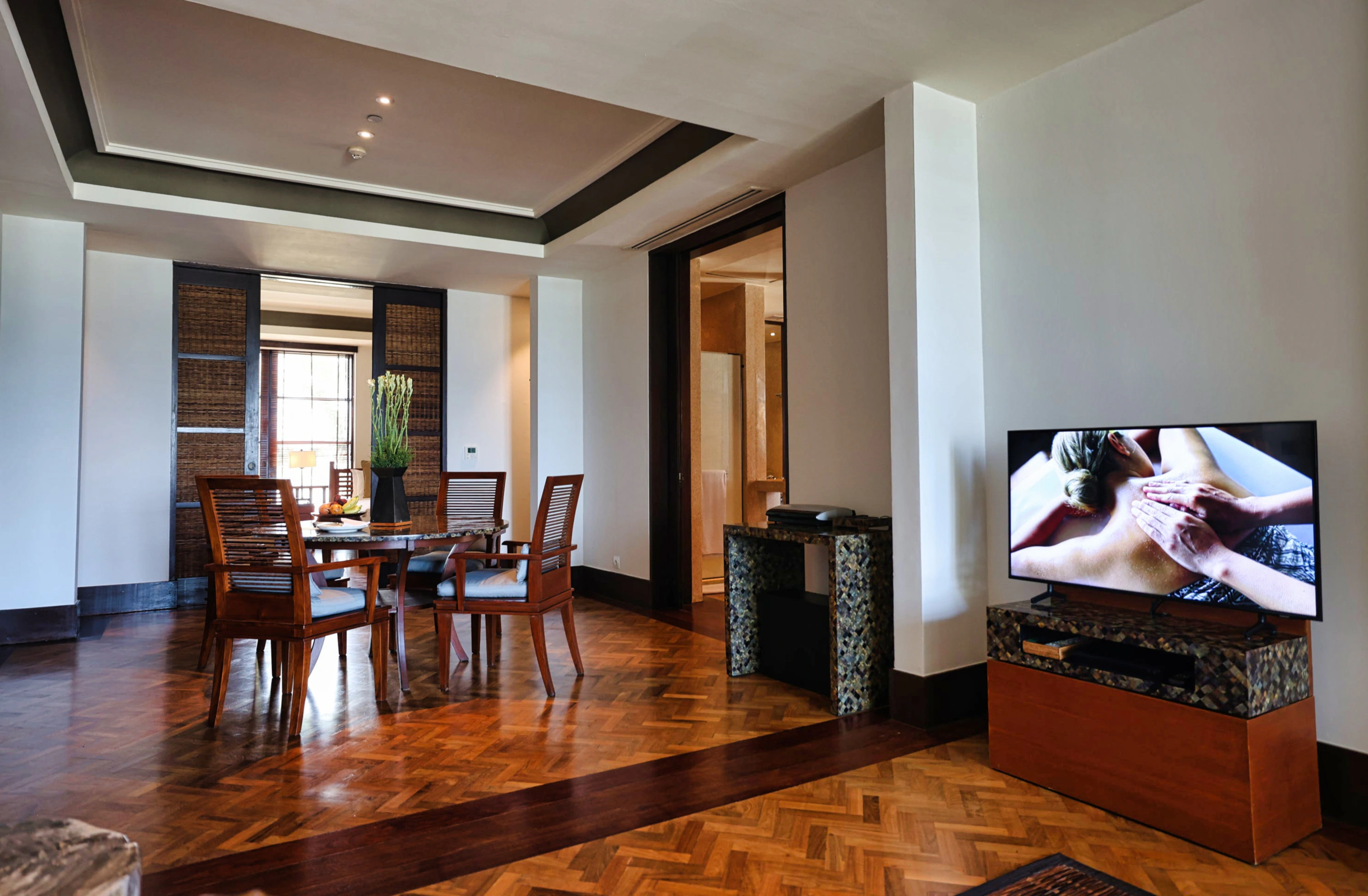 Overview of a spacious hotel suite living area
