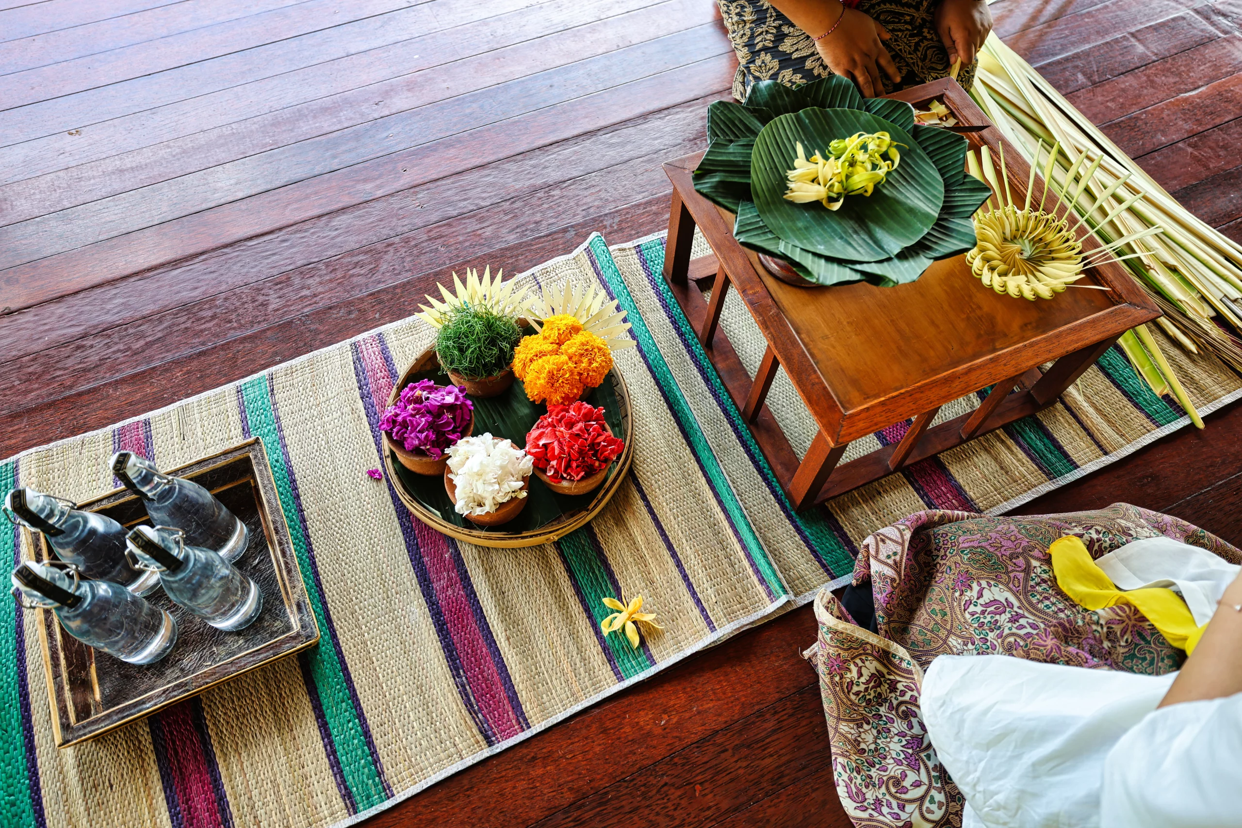 Preparing canang offerings for blessing ceremony