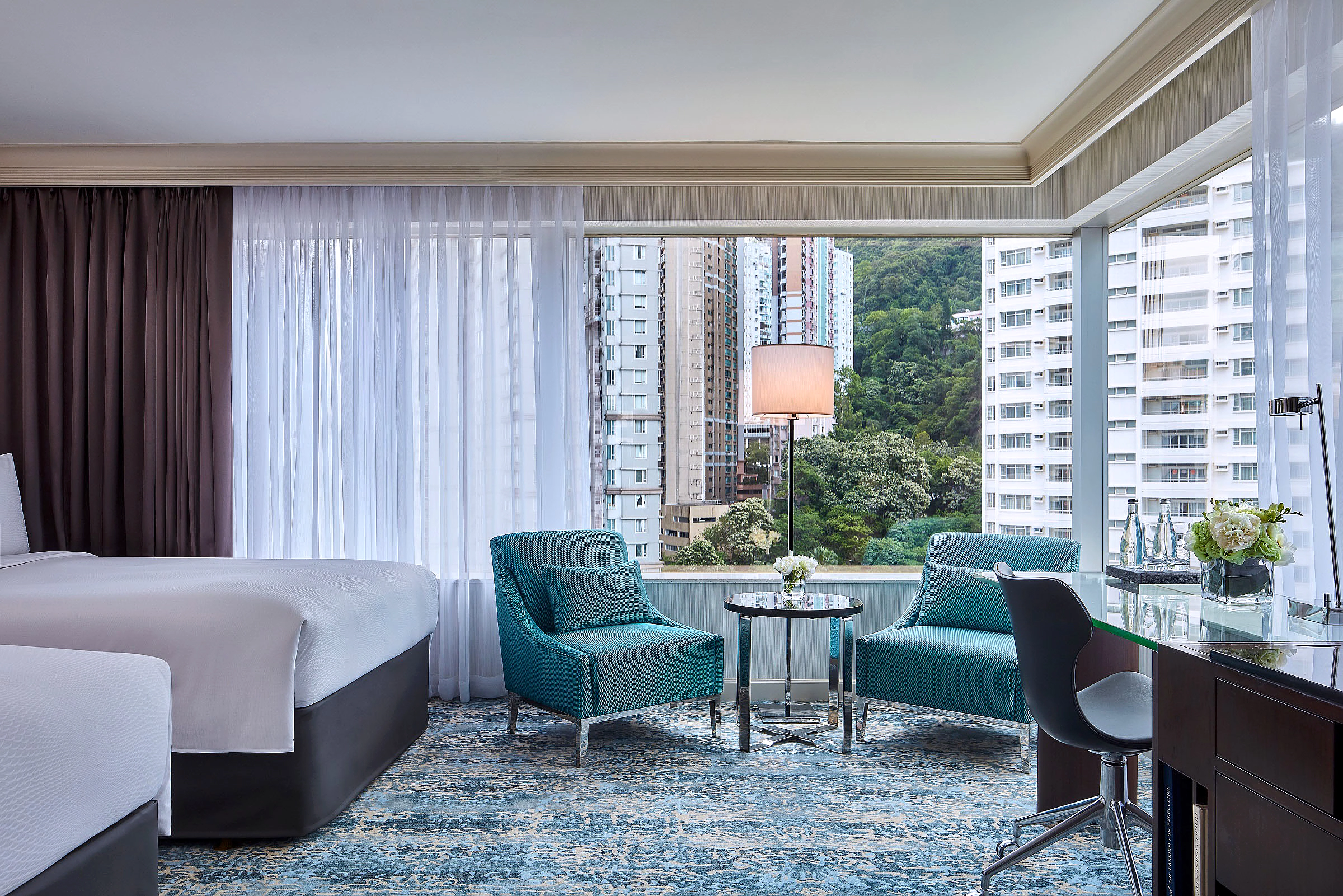 JW Marriott guest room with harbor view