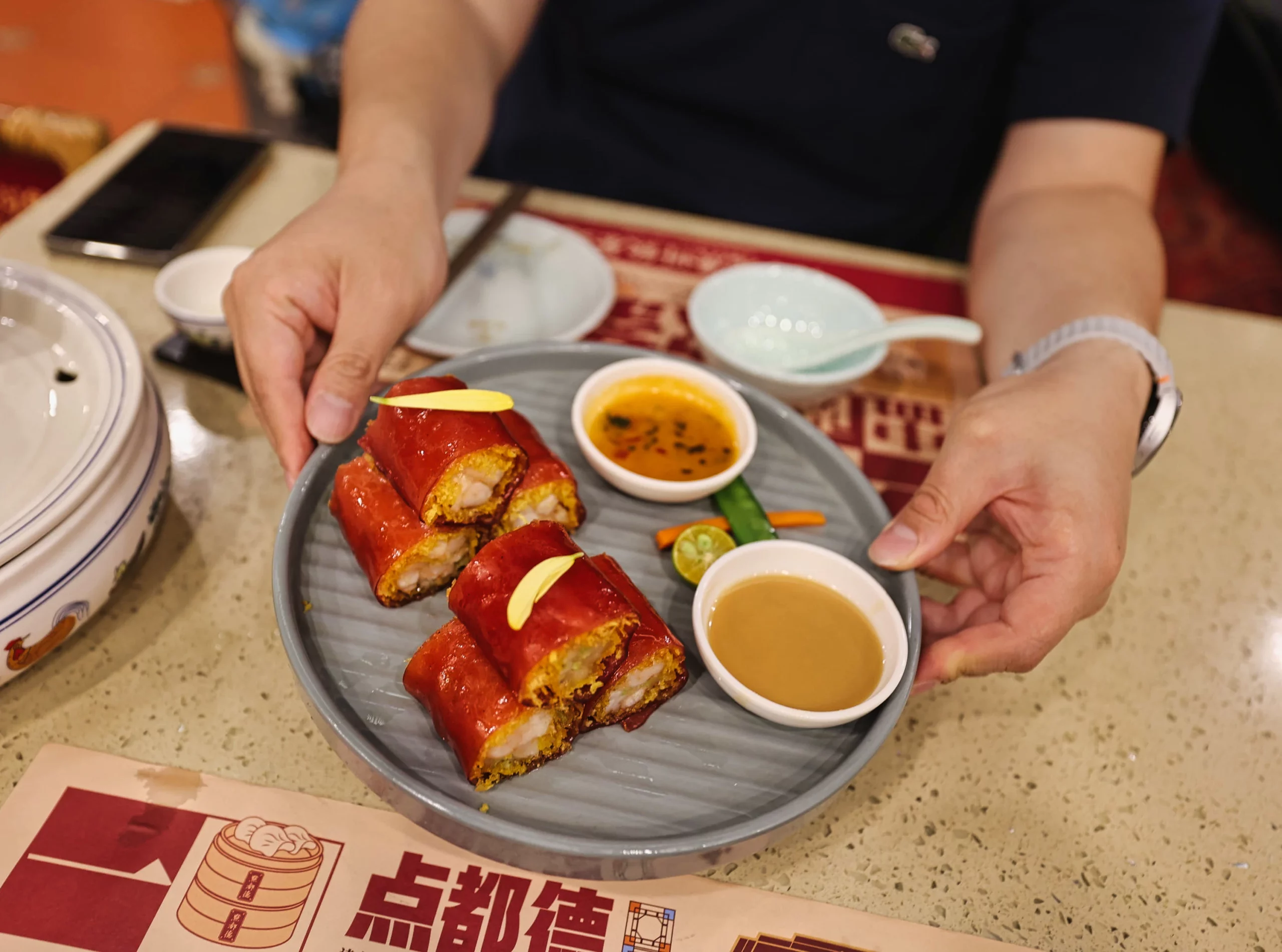 Signature Hongmi Changfen (Red Rice Roll) served first