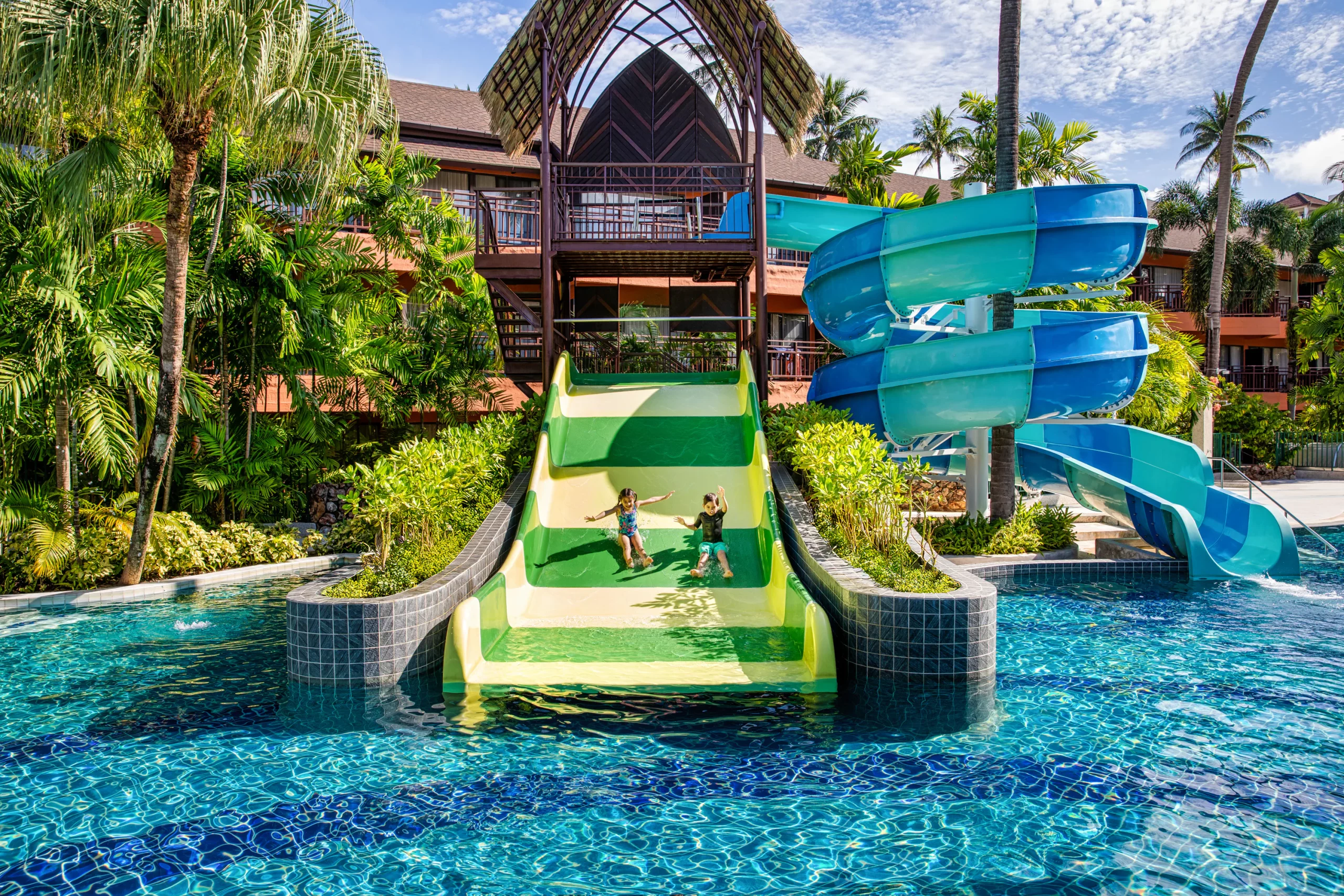 Children playing on the water slide at the Fun Pool