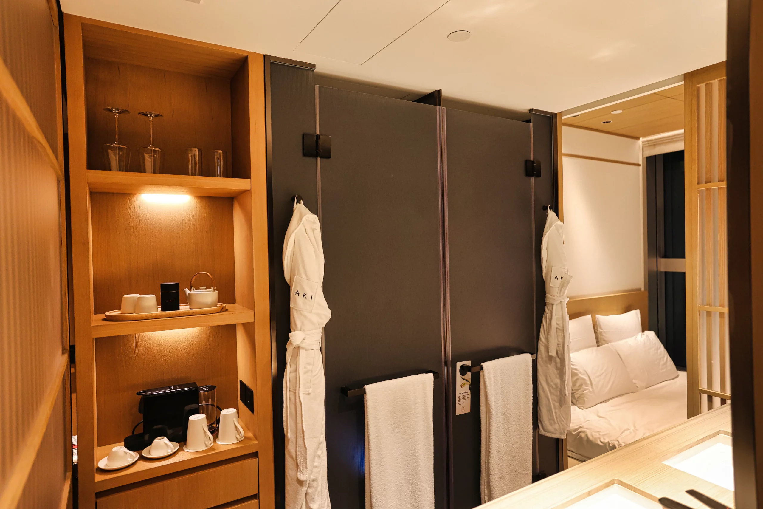Bathroom with double sinks at AKI Hong Kong