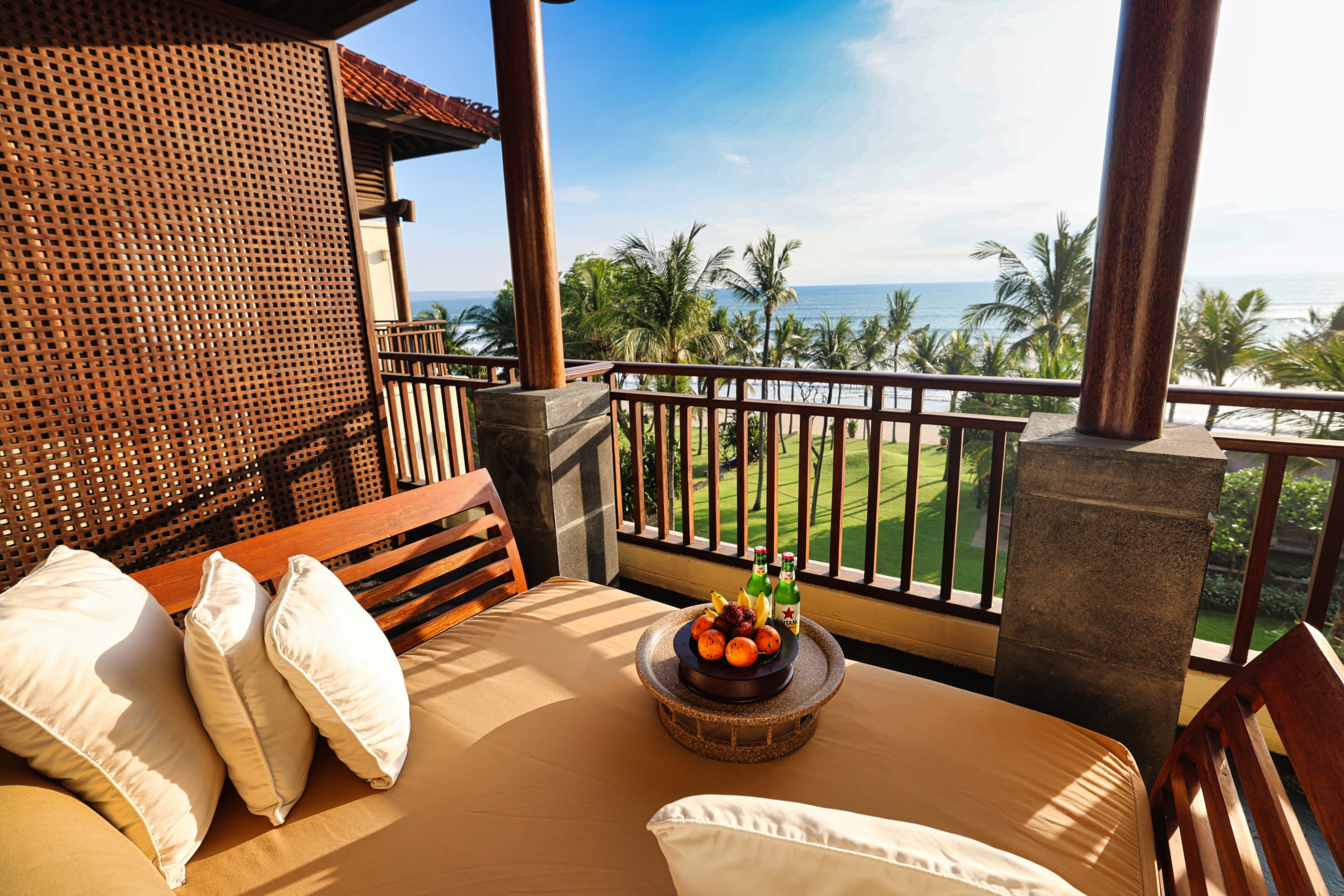 Private balcony with sun lounger overlooking the ocean