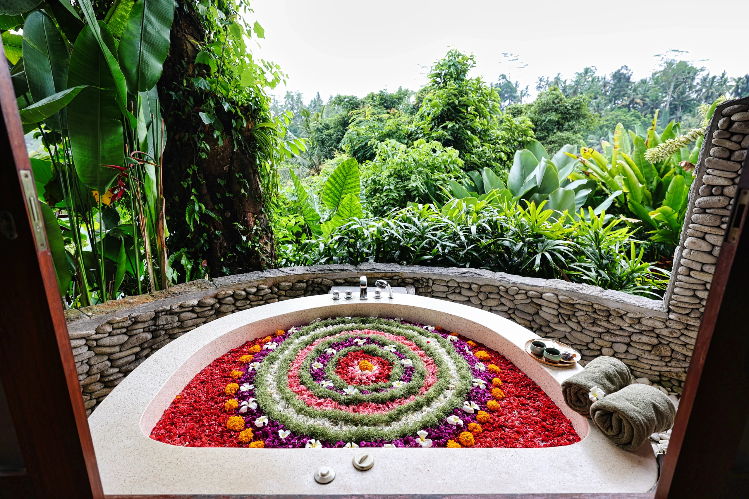 Romantic flower bath with jungle view